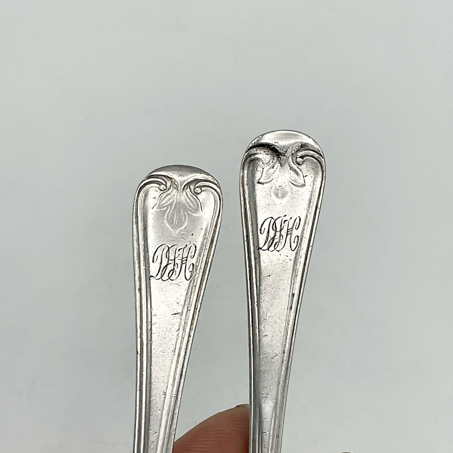 Tops of the silver handles showing DJH engraved