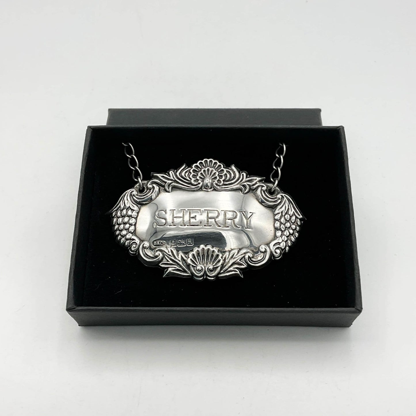 1982 Sterling Silver Sherry Decanter Label