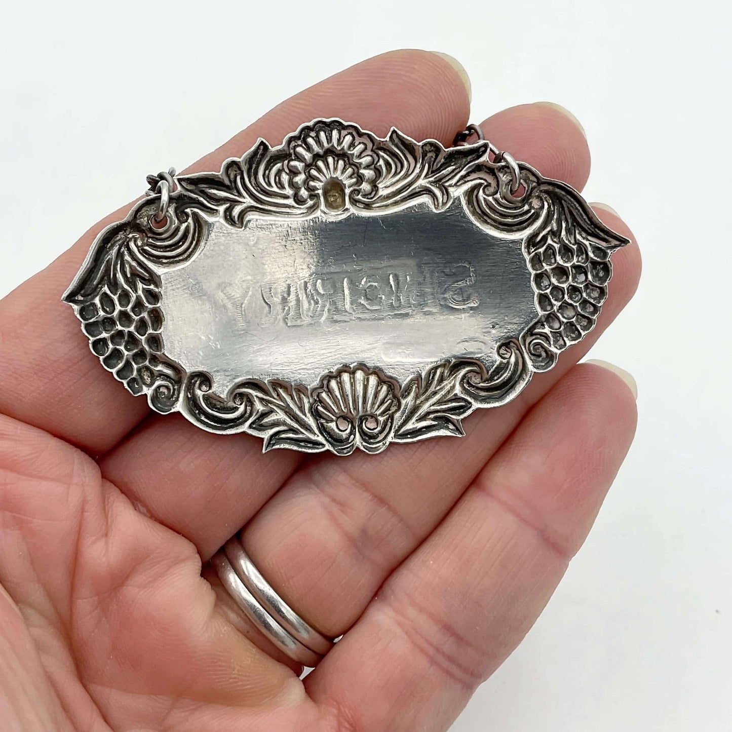 1982 Sterling Silver Sherry Decanter Label