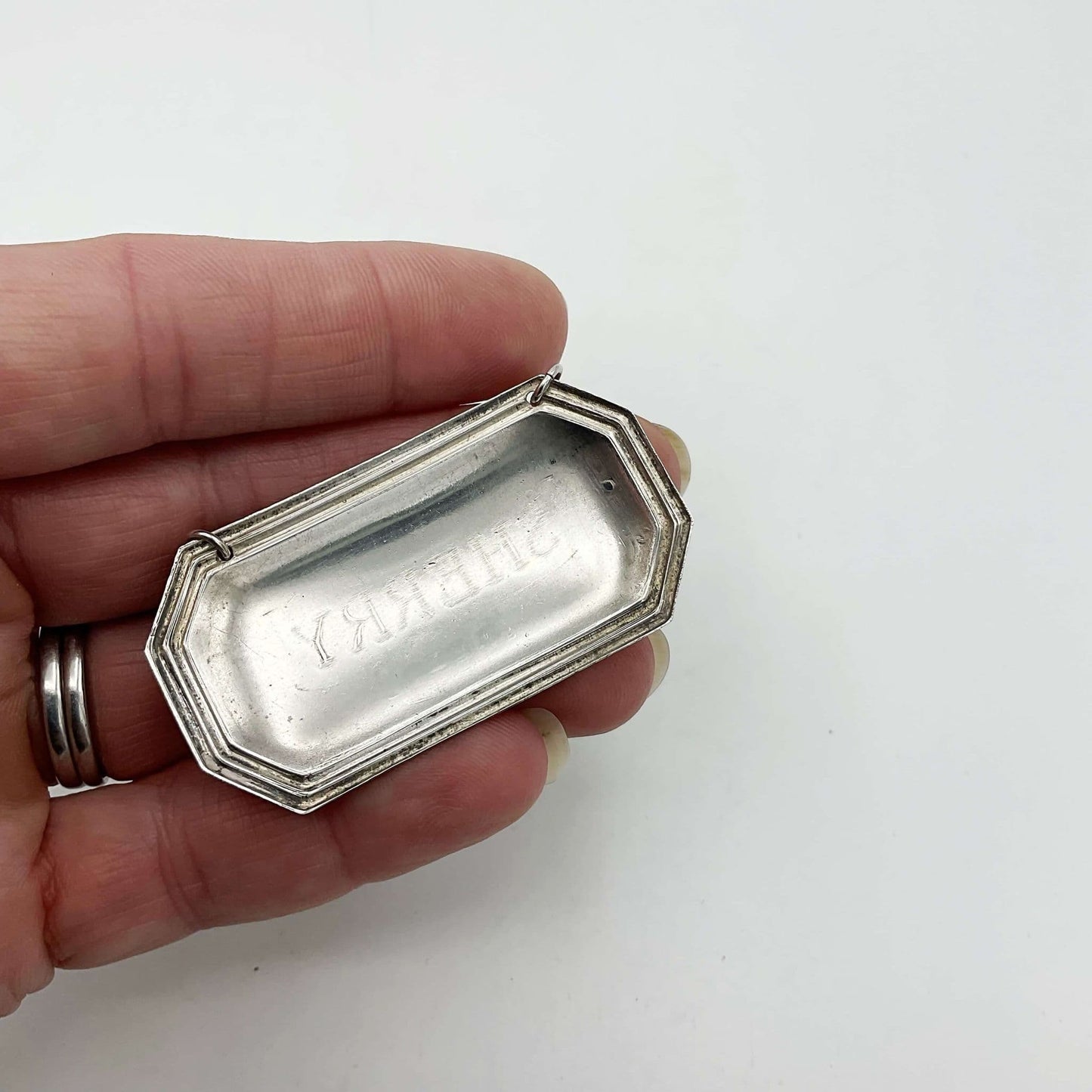 1989 Sterling Silver Sherry Decanter Label