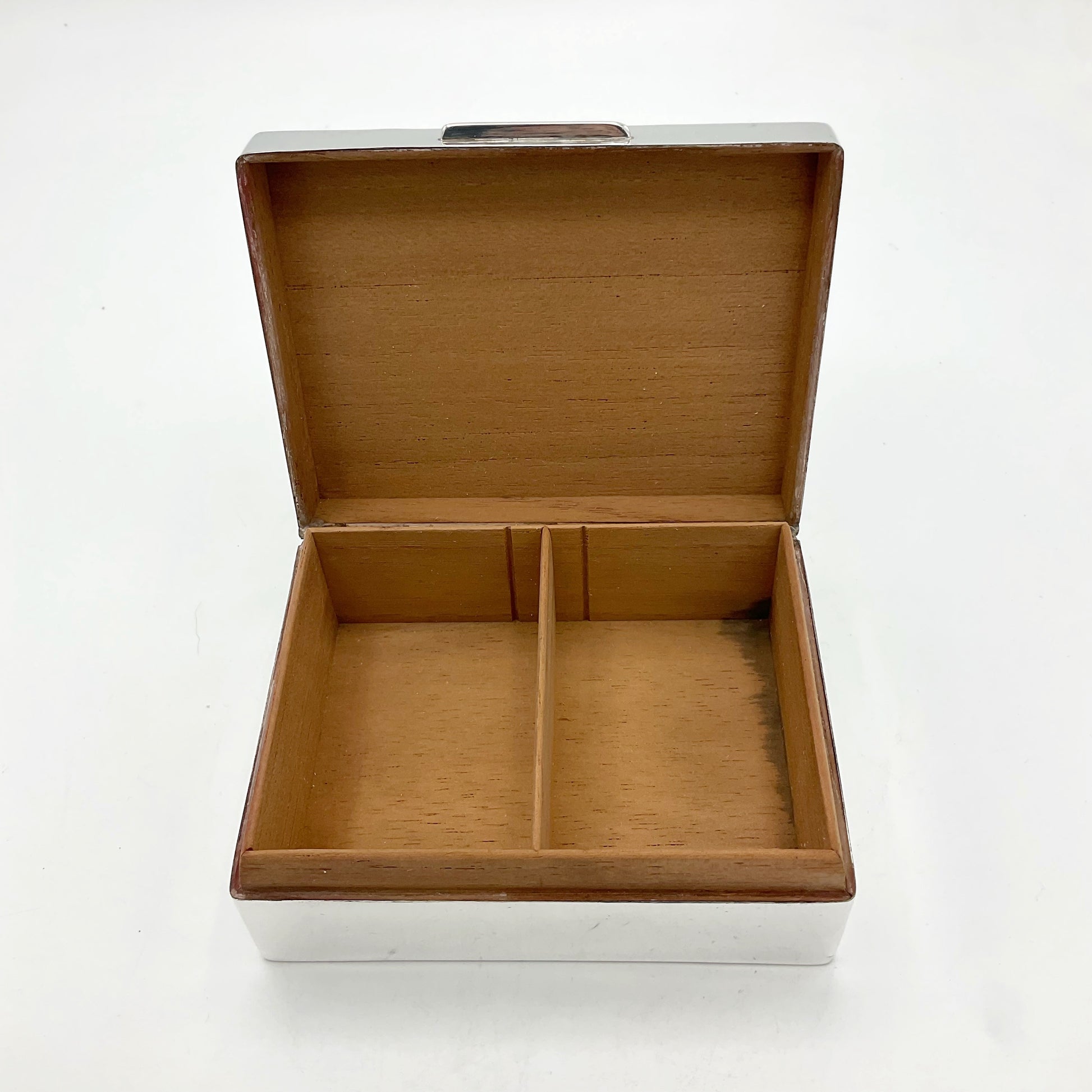 Vintage cigarette box lid open showing fully lined cedar wood interior and a divider in the middle