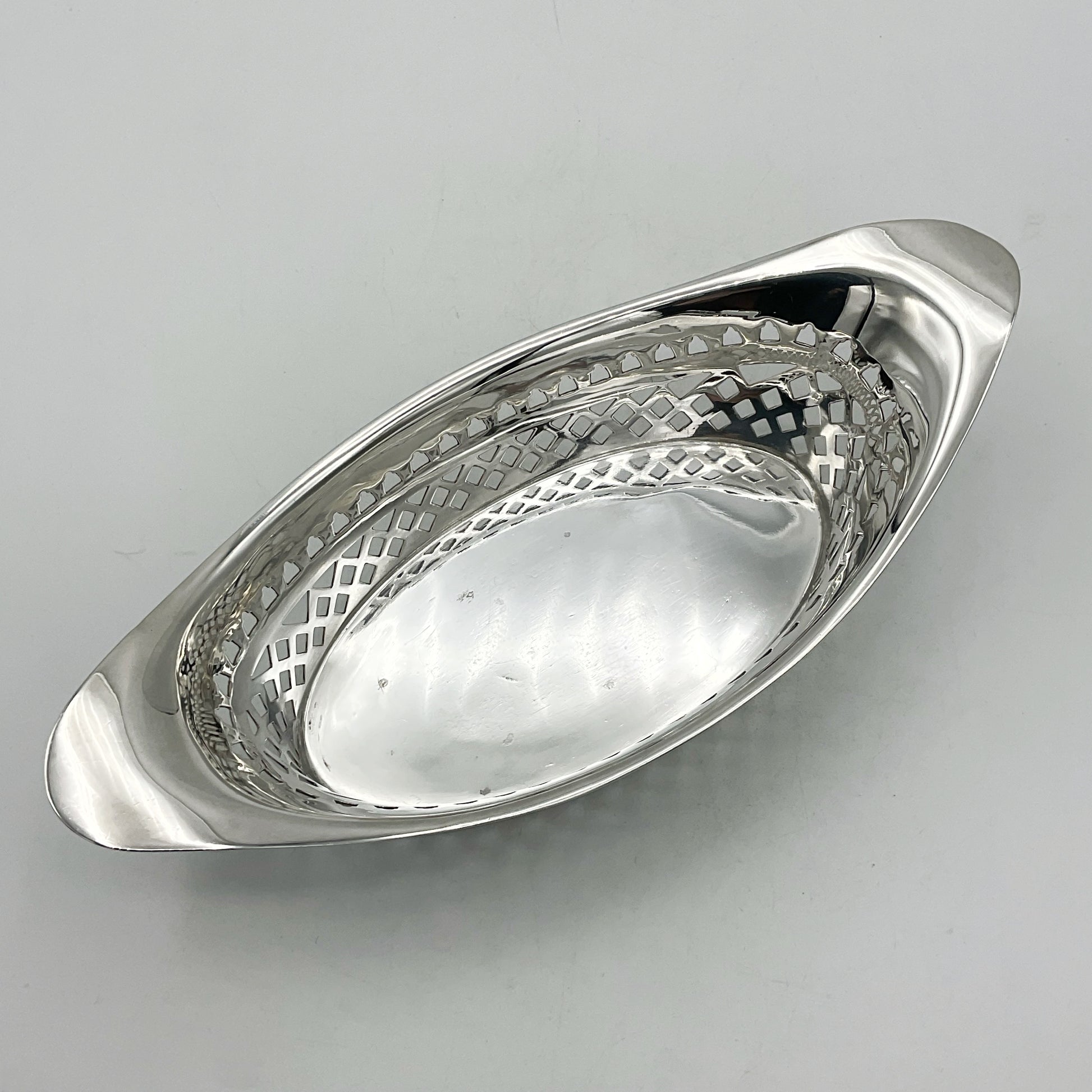 Antique silver pierced bowl with solid base