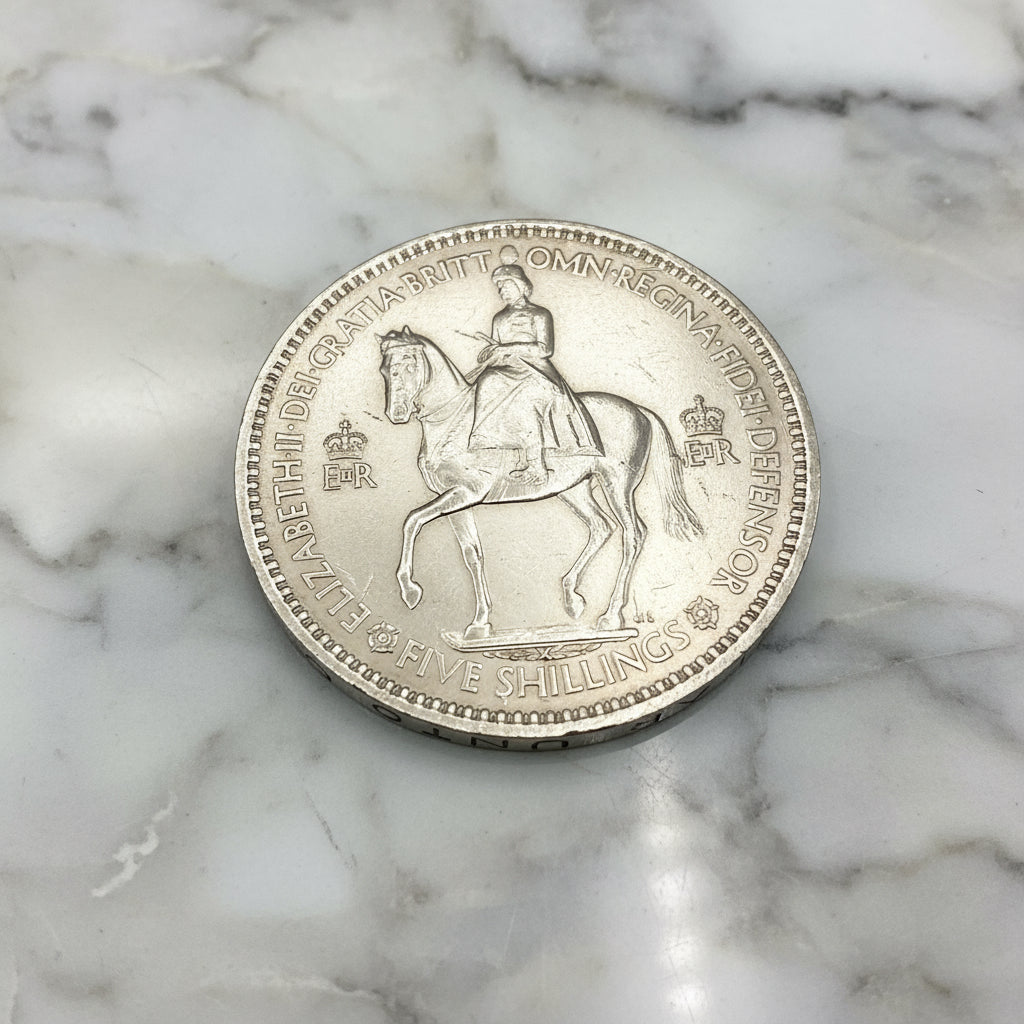 Reverse of 1953 Queen Elizabeth II coronation Coin on marble