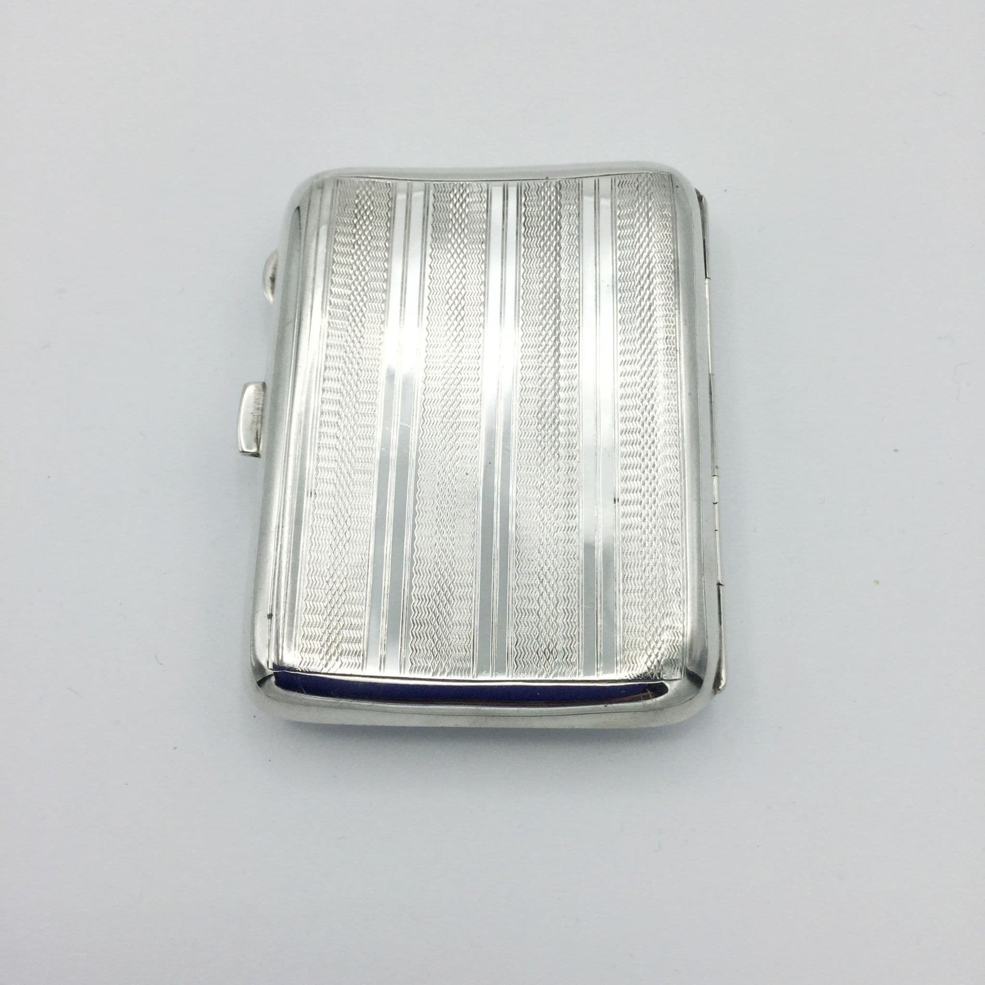 back of art deco silver cigarette case