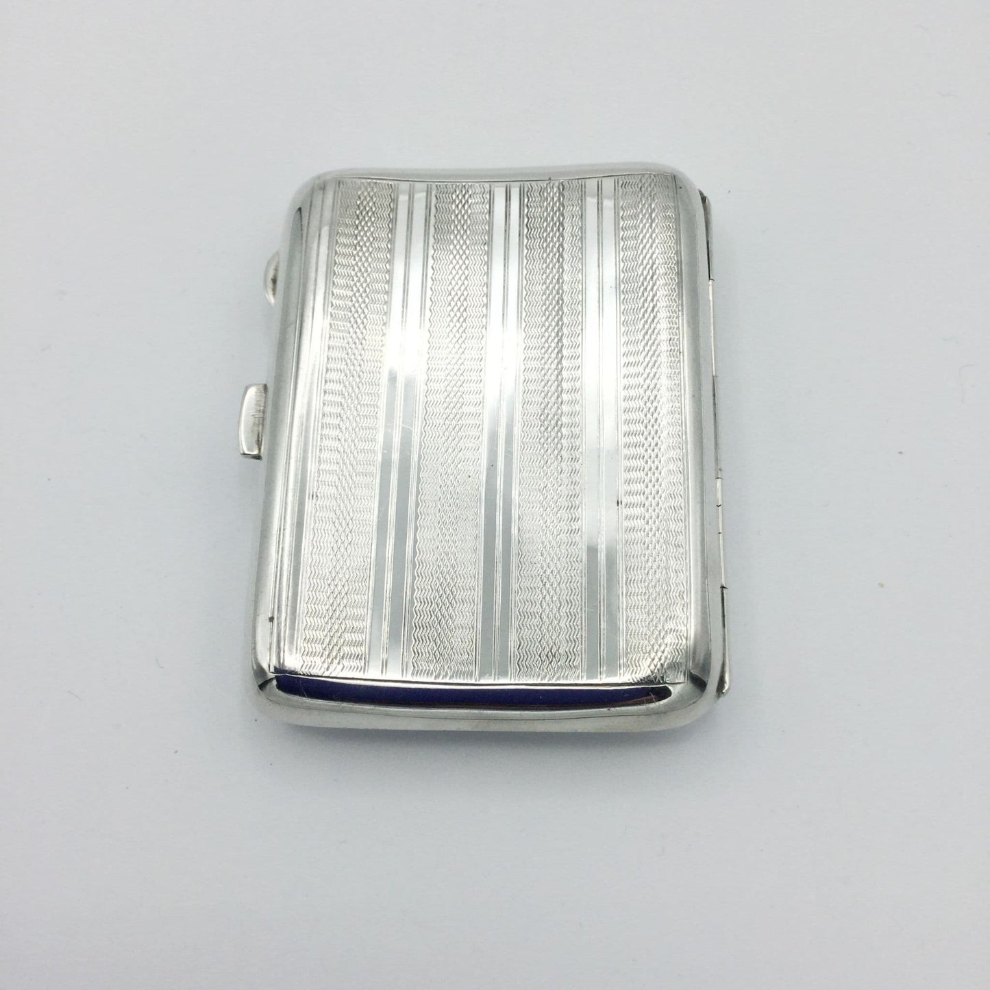 back of art deco silver cigarette case