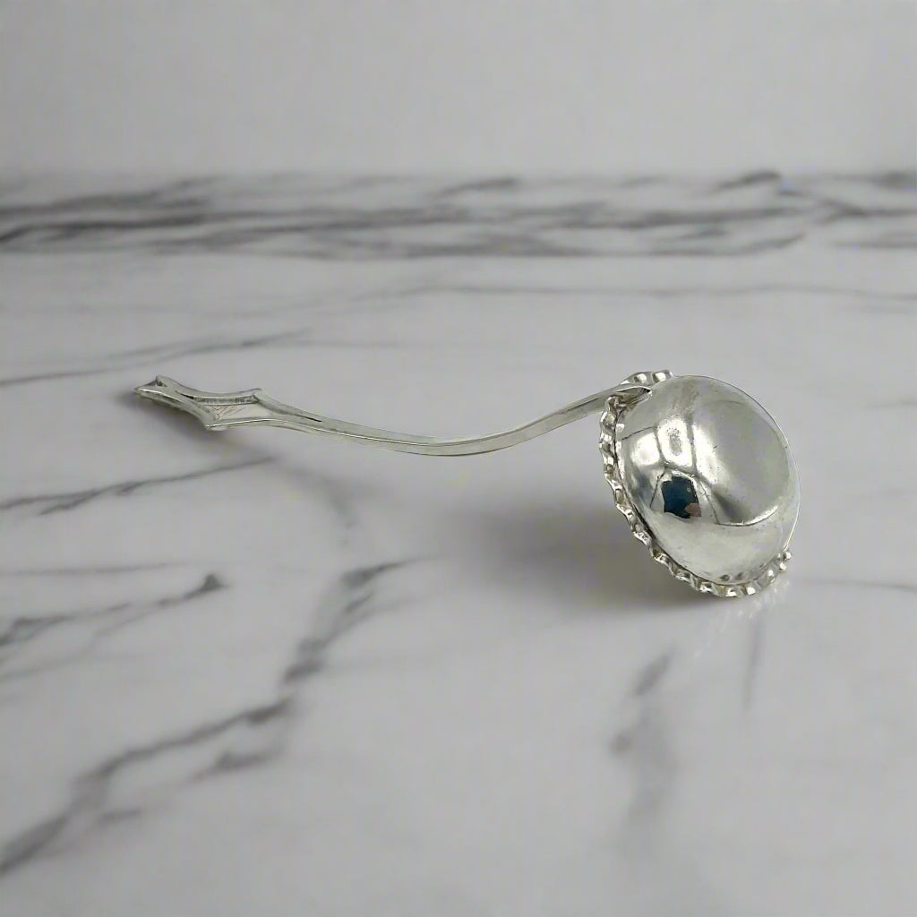 Small ladle on a marble surface