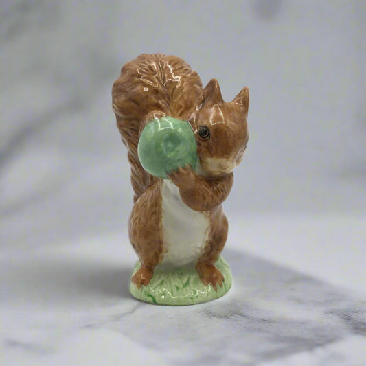 squirrel figurine on marble worktop