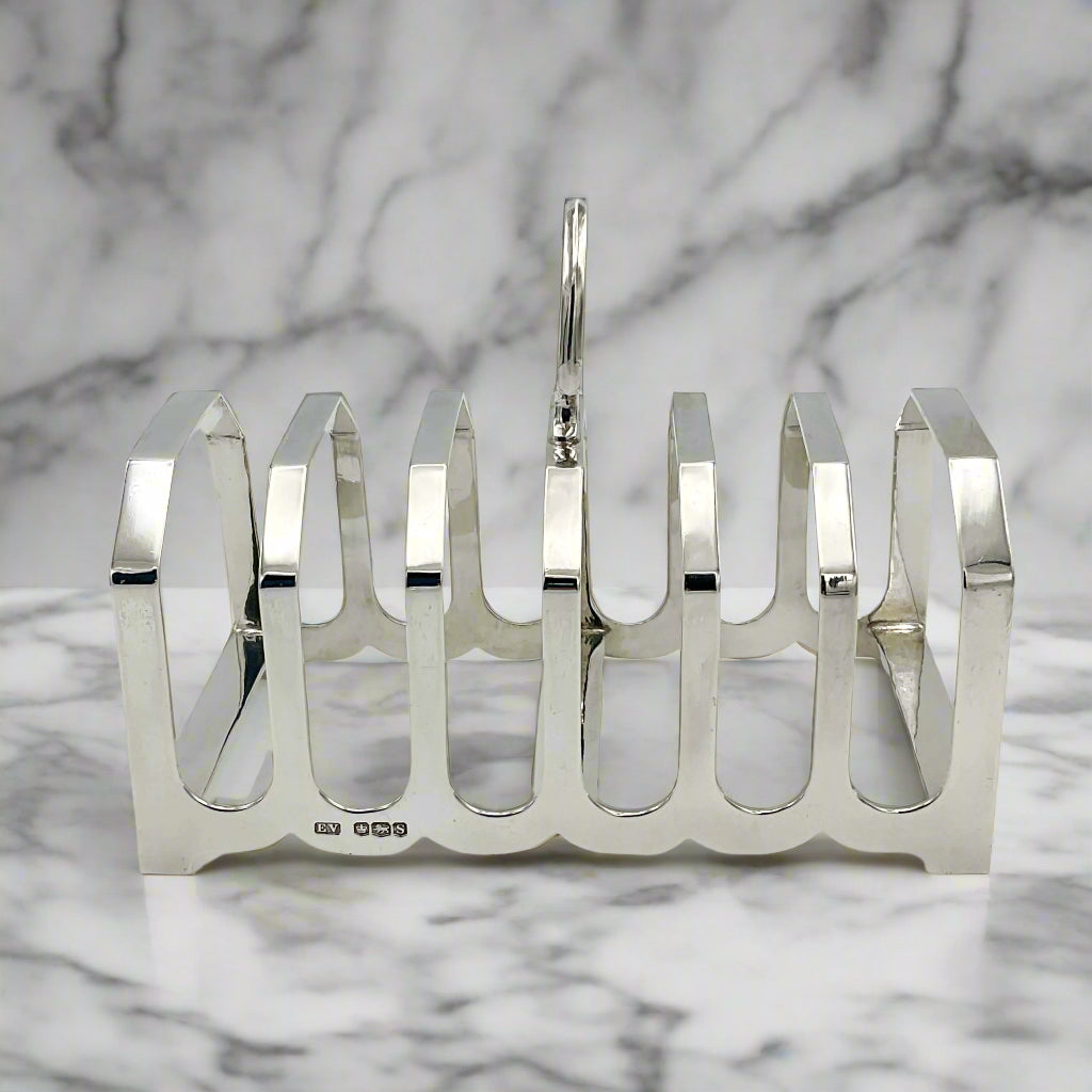 Silver toast rack on a marble background