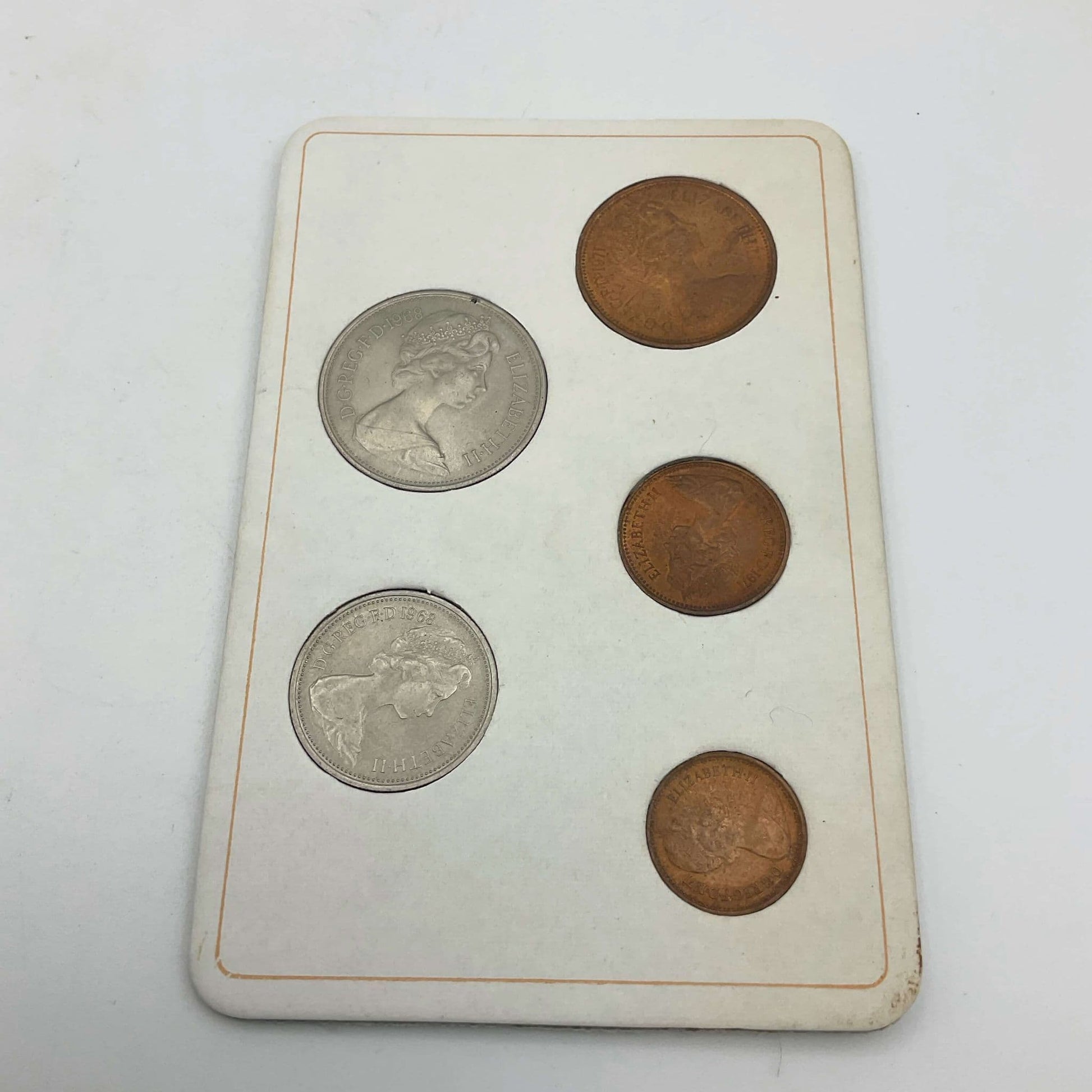 The reverse view of the coins in Britain's First Decimal Coins Set