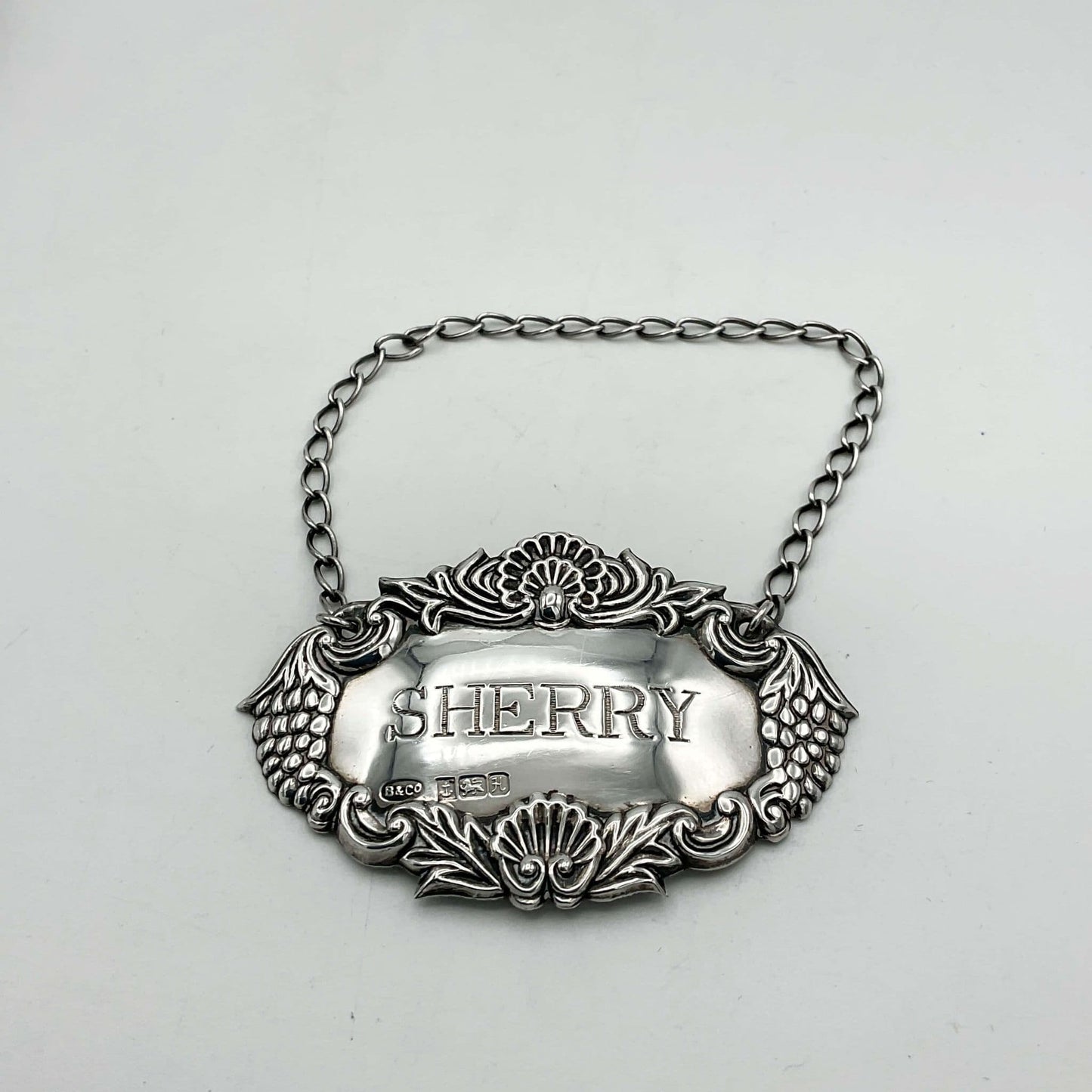 1982 Sterling Silver Sherry Decanter Label