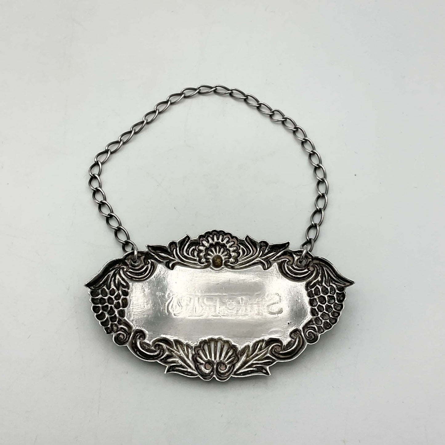 1982 Sterling Silver Sherry Decanter Label