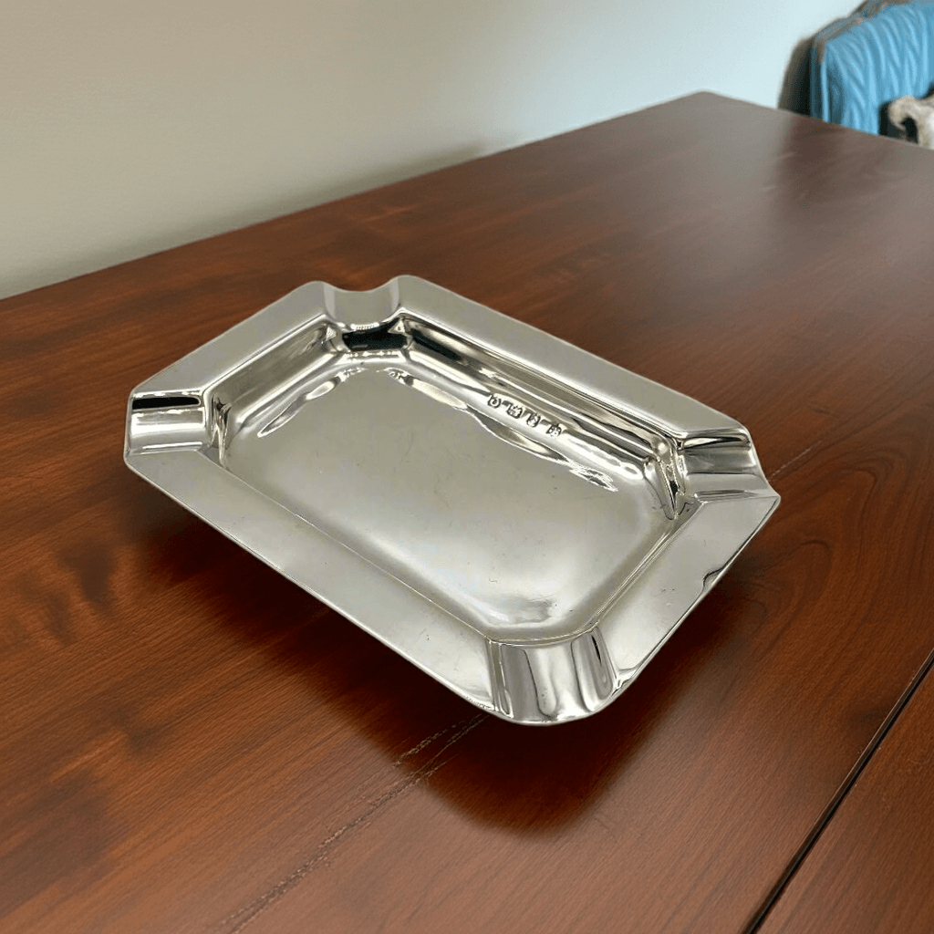 Silver tray on a wooden table