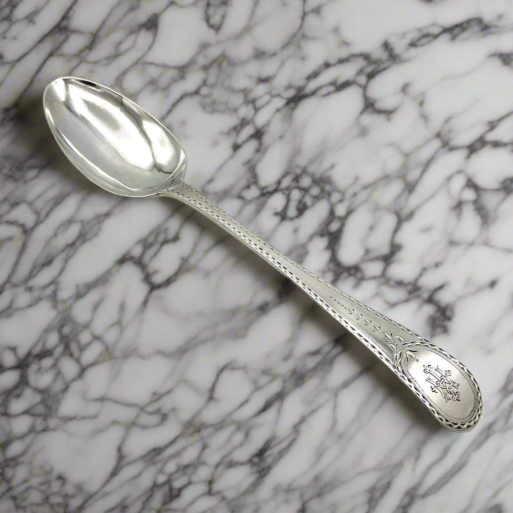 Brightcut silver tablespoon on a marble surface