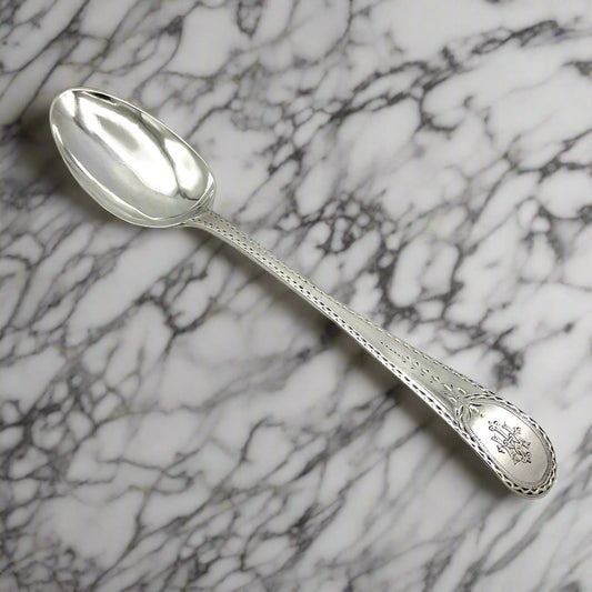 Brightcut silver tablespoon on a marble surface