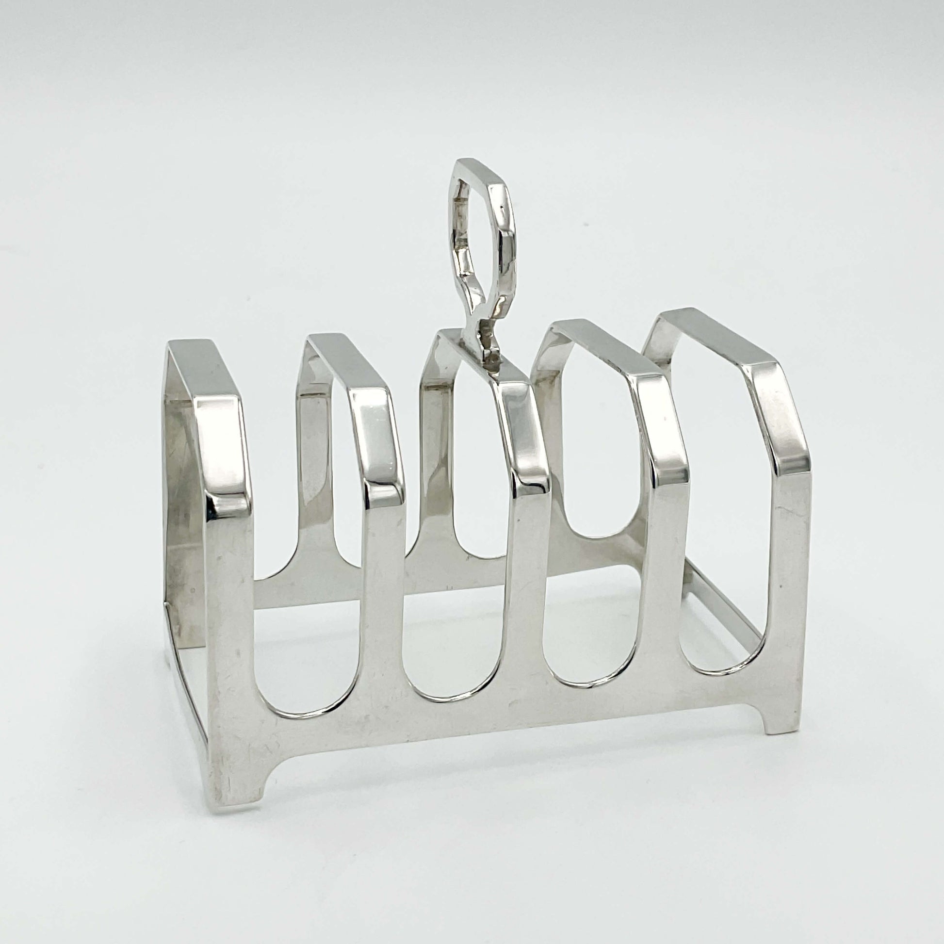 Side view of Antique silver toast rack