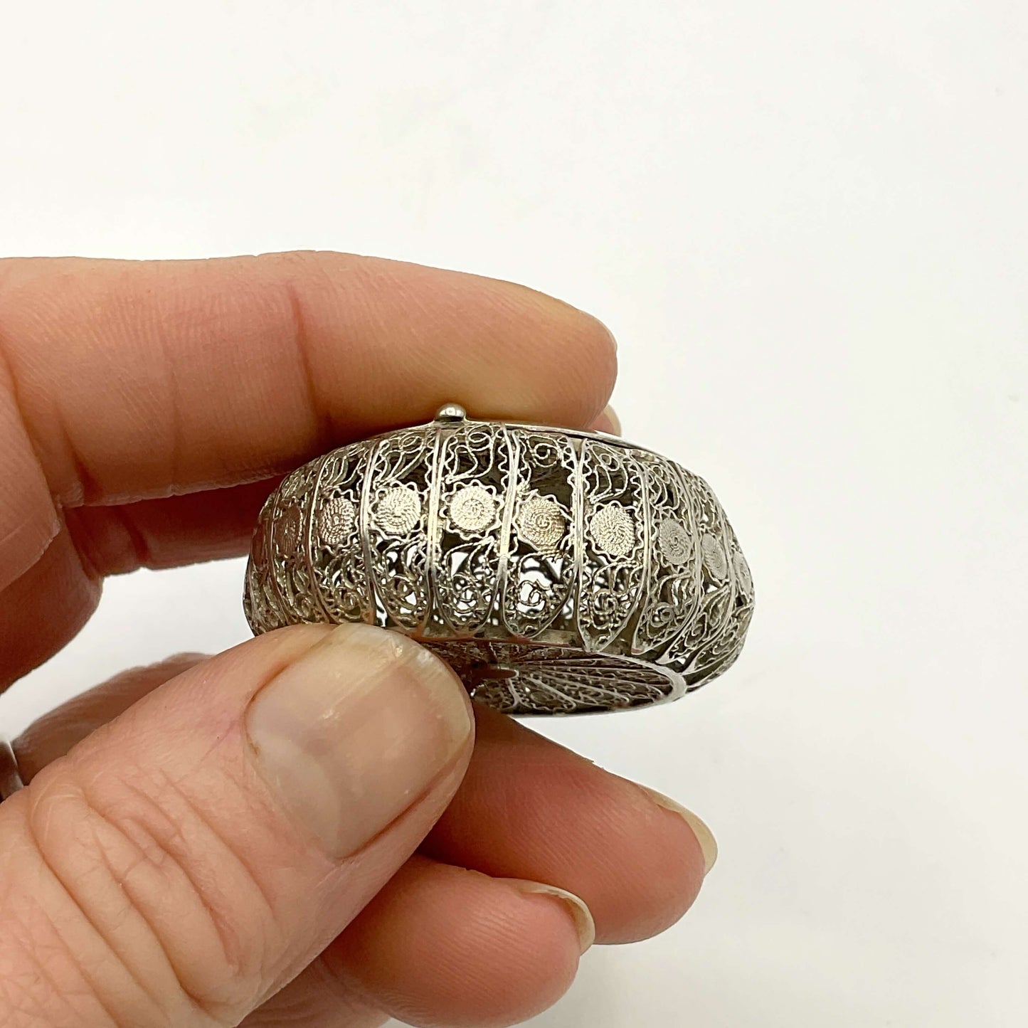 Antique Silver Filigree Box with intricate designs against a white background