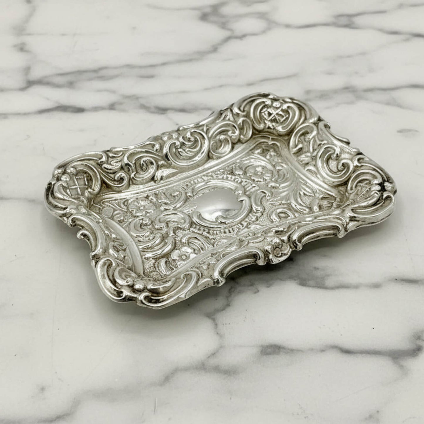 Antique Small Repousse Silver Tray on marble