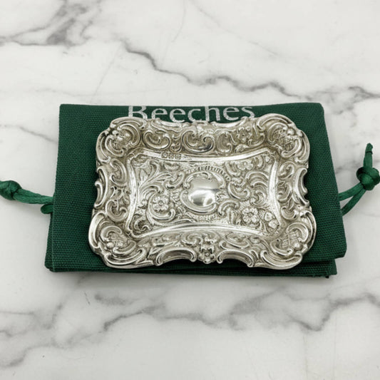 Antique Small Repousse Silver Tray on a green bag and marble surface