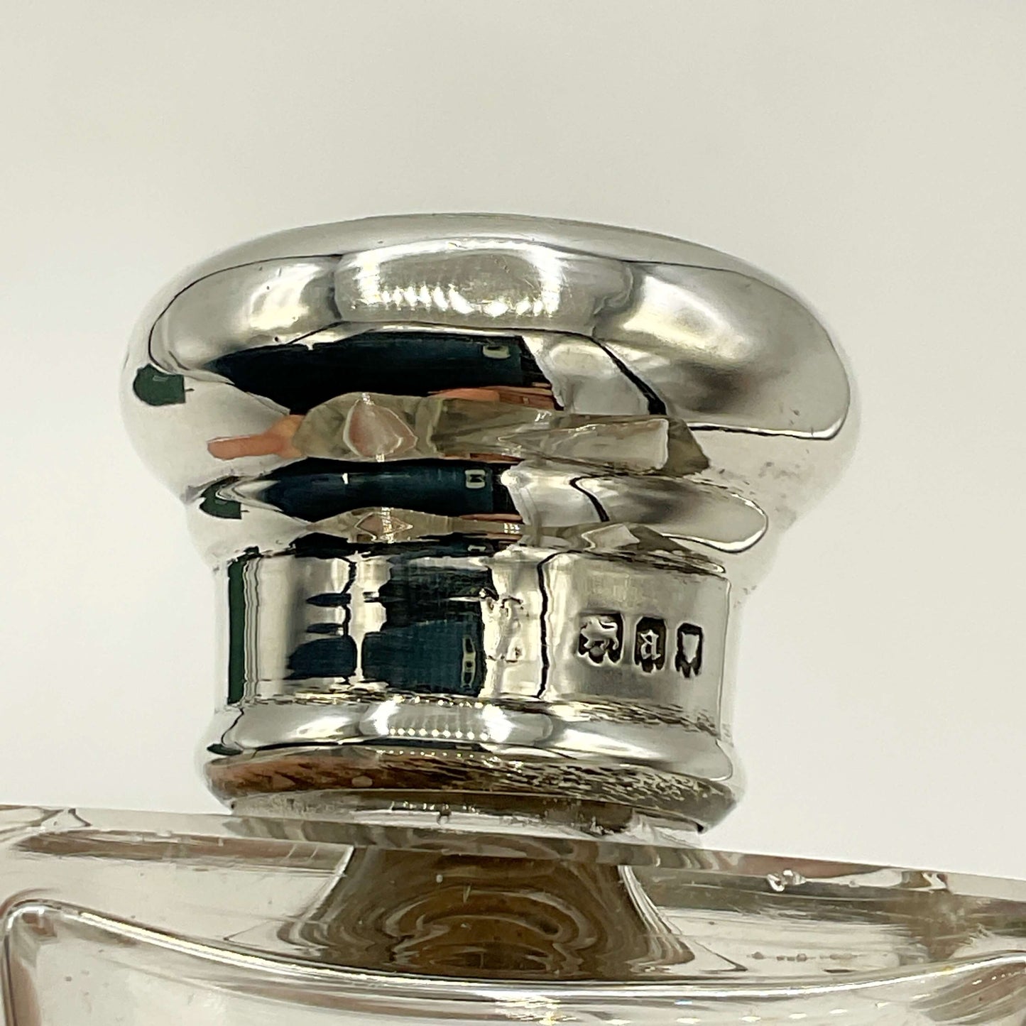 Antique Sterling Silver Topped Bottle hallmarks on a white background