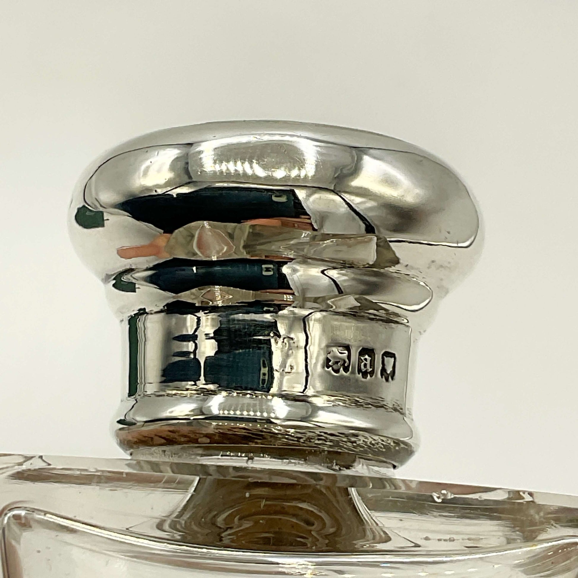 Antique Sterling Silver Topped Bottle hallmarks on a white background