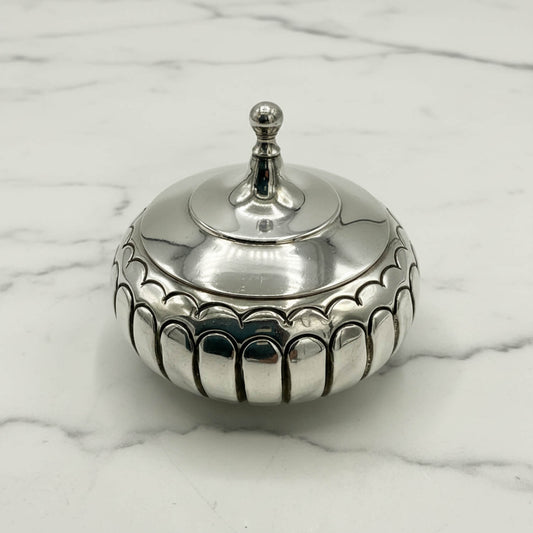 Antique Victorian Sterling Silver Box on a marble surface