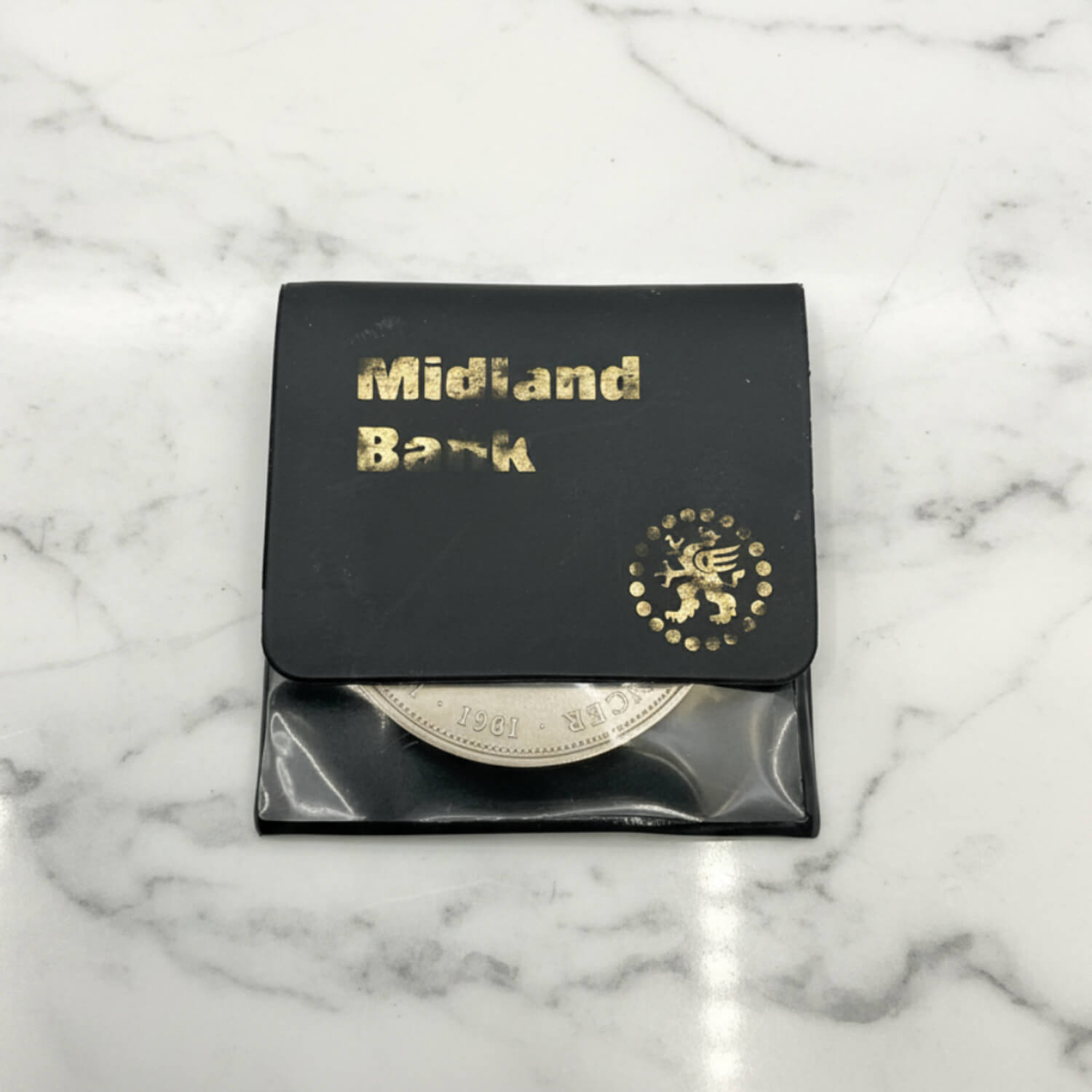 Charles and Diana 1981 Royal Wedding Coin on a marble surface