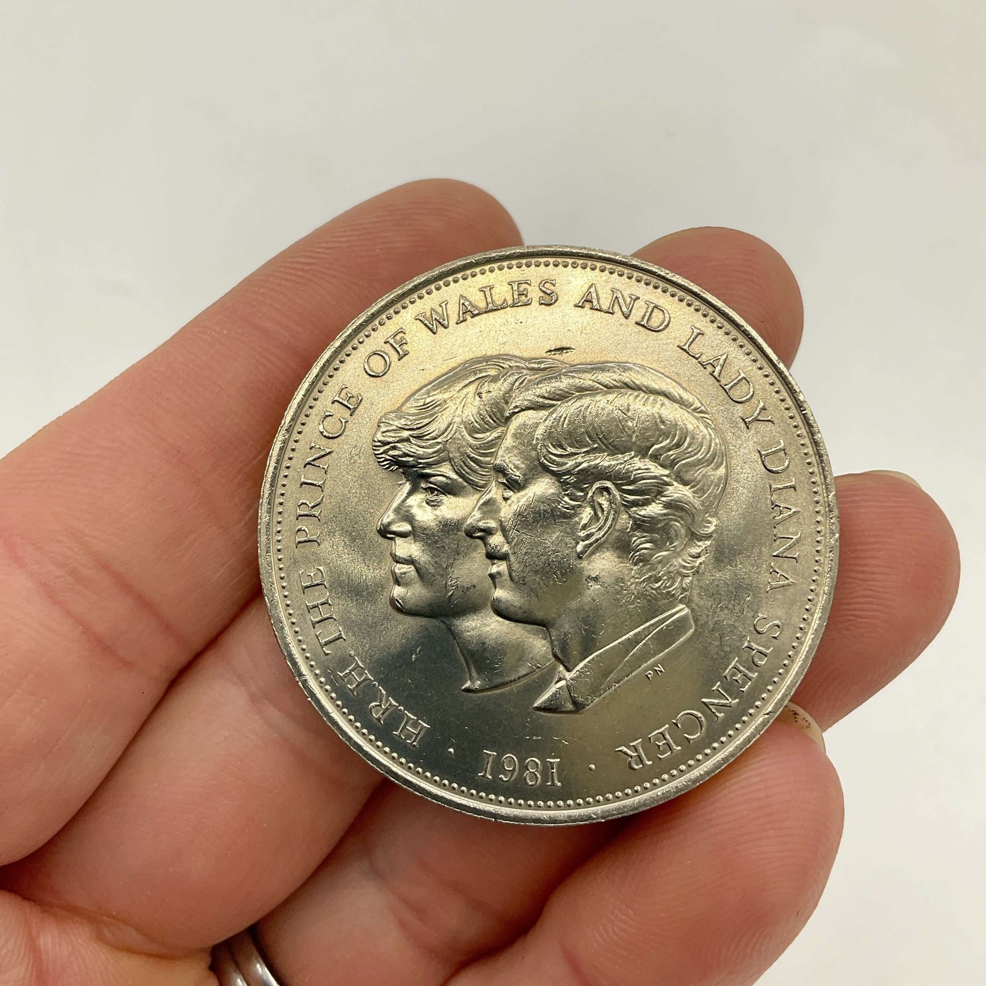Charles and Diana 1981 Royal Wedding Coin held in a hand