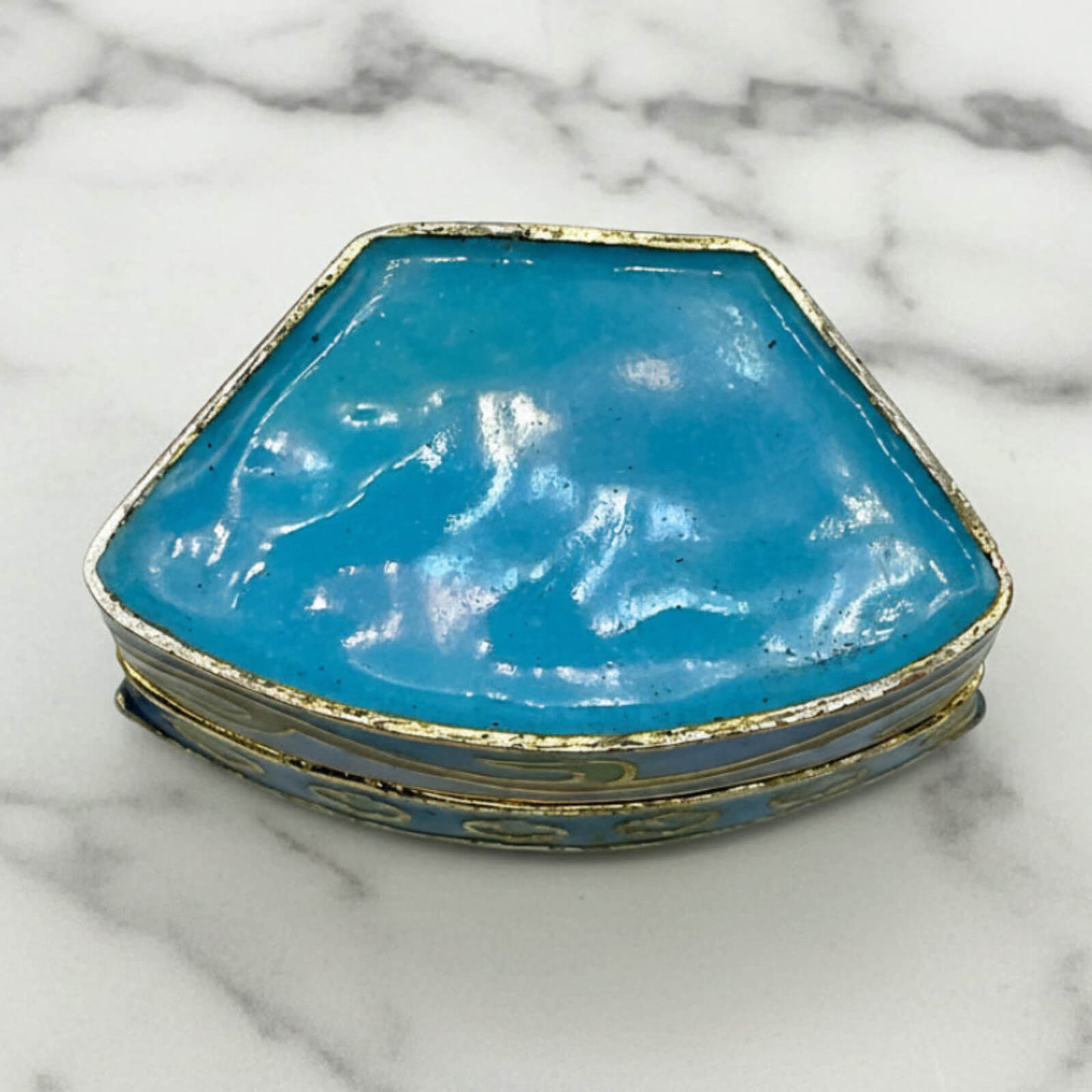 Chinese Cloisonné Enamel Pill Box base on a marble surface