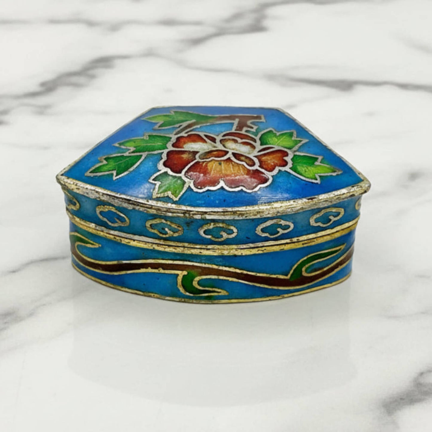 Chinese Cloisonné Enamel Pill Box front view on a marble surface