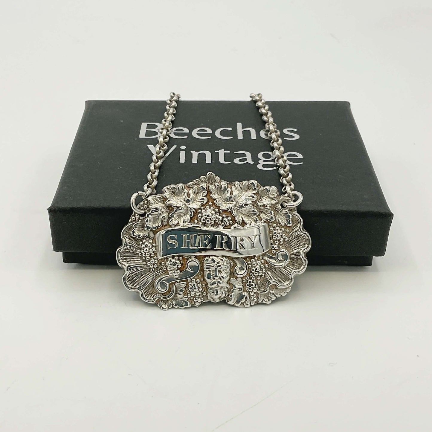 Silver 'Sherry' decanter label on a white background with a 'Beeches Vintage' box.