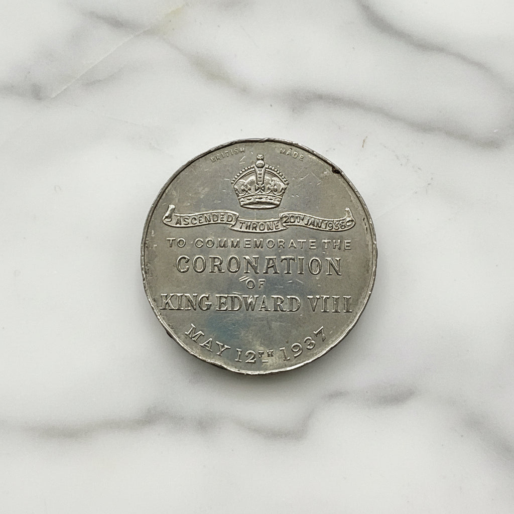 Medal for Commemorating the Coronation of King Edward VIII on a marble background 