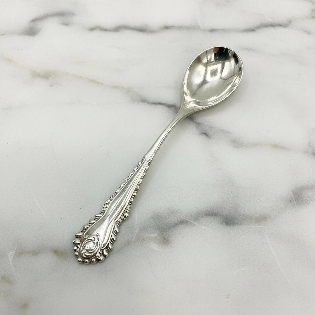Silver spoon on a marble background