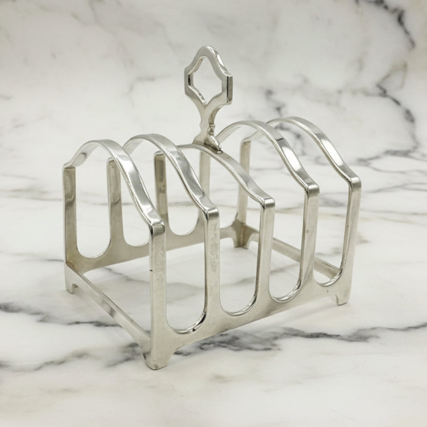 Silver toast rack on a marble background