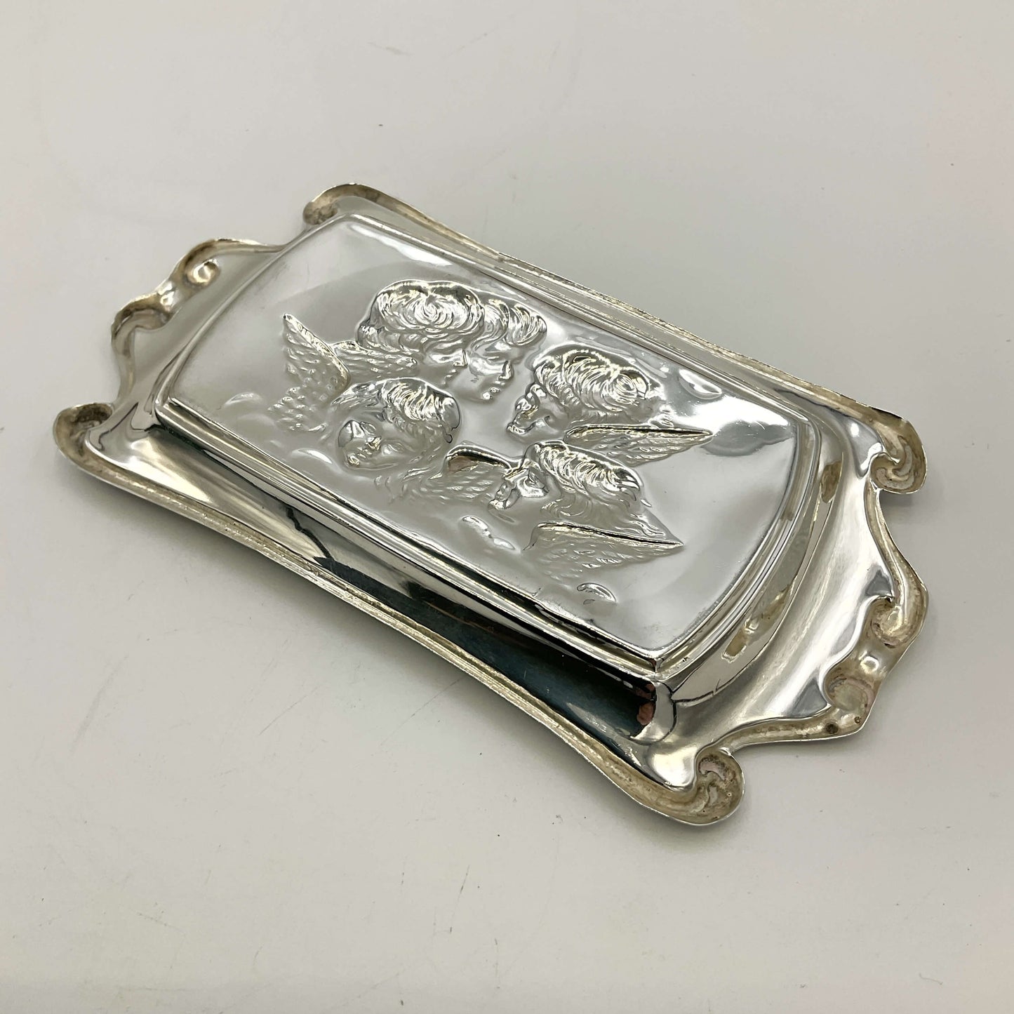 Antique Beeches Vintage silver repousse pin tray with intricate floral designs, oval shape, and detailed craftsmanship.