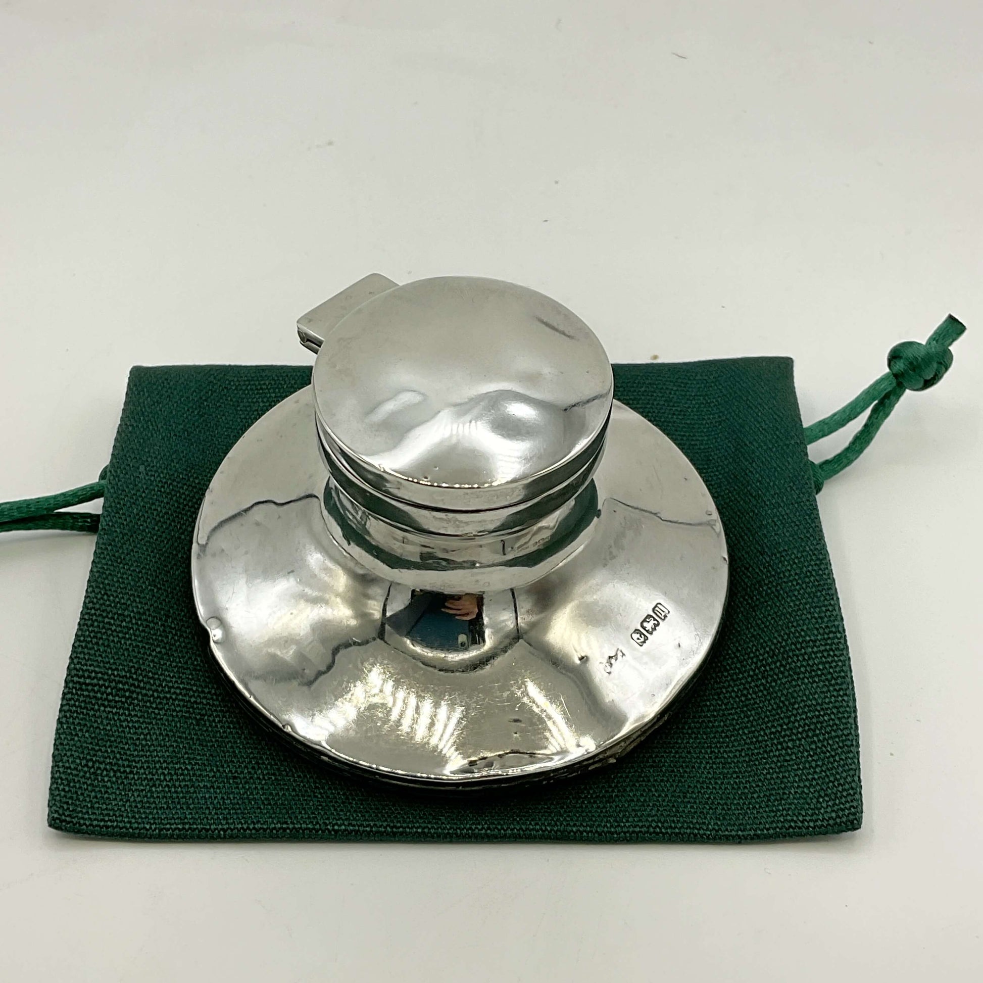Small antique sterling silver inkwell with ornate design, from Beeches Vintage, showcasing a vintage writing accessory.