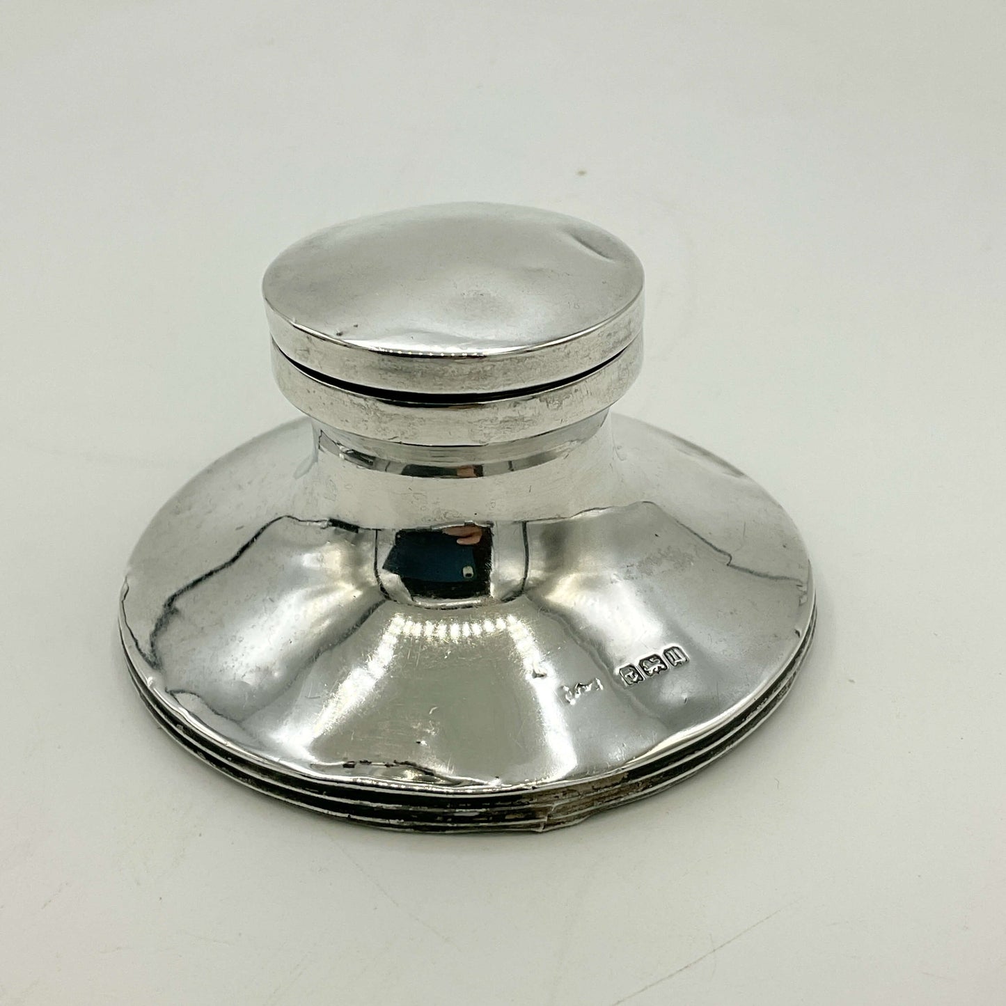 Antique small sterling silver inkwell with engraved details, vintage style, by Beeches Vintage, displayed on a wooden surface.
