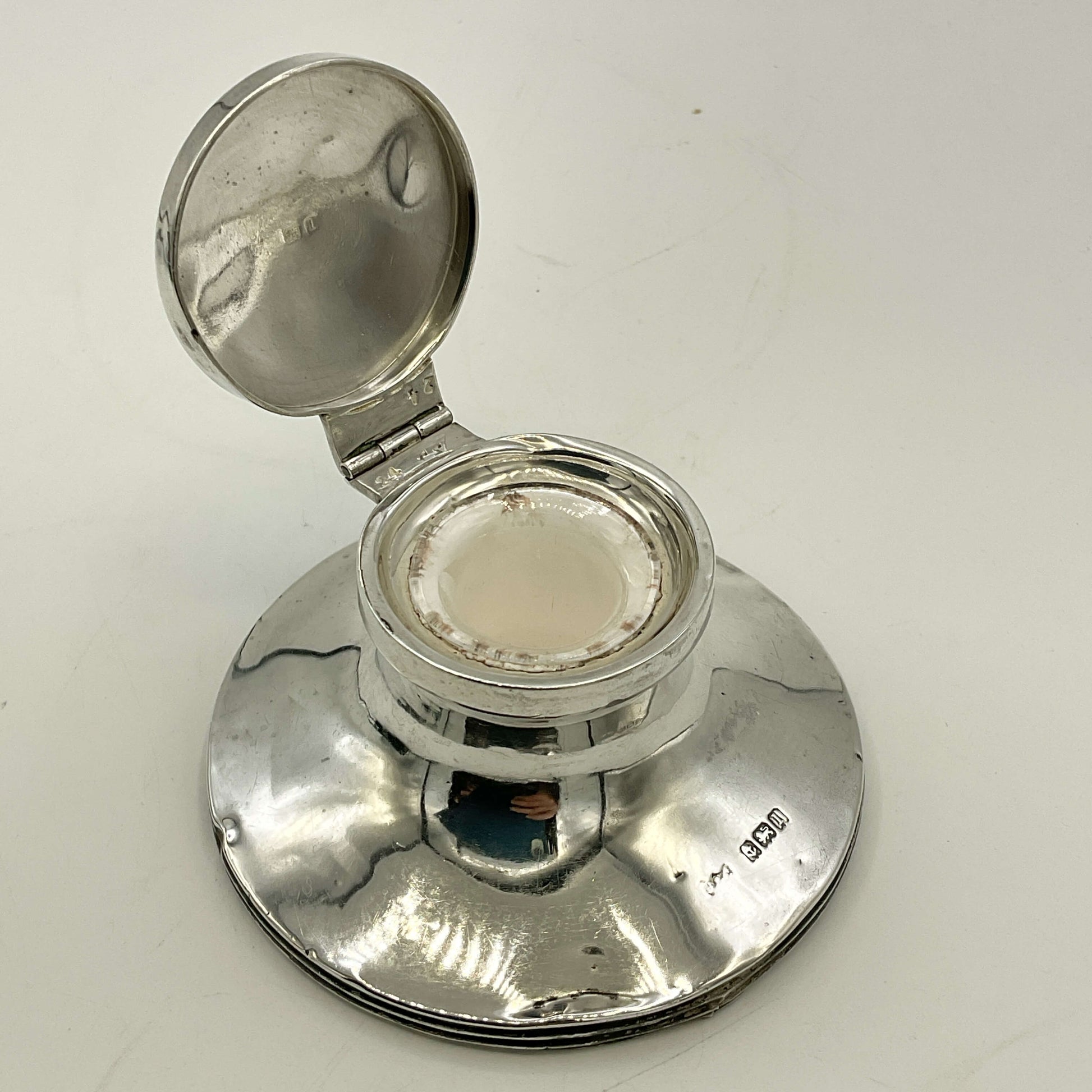 Small antique sterling silver inkwell by Beeches Vintage, featuring intricate detailing and classic design.
