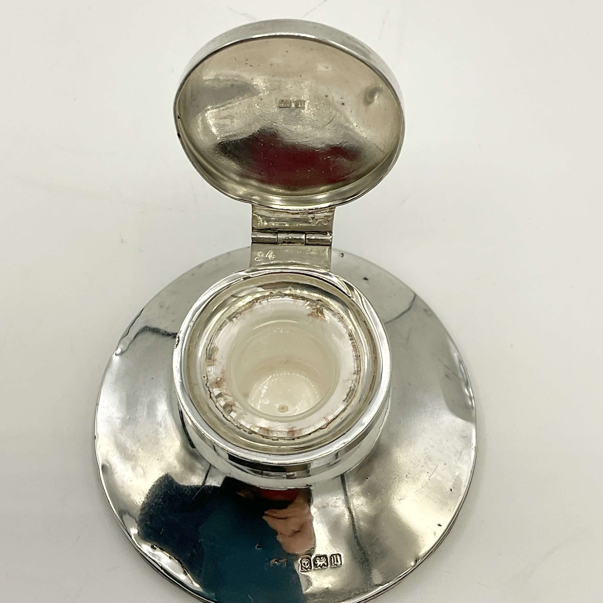 Small antique sterling silver inkwell by Beeches Vintage, featuring engraved details and a classic design.
