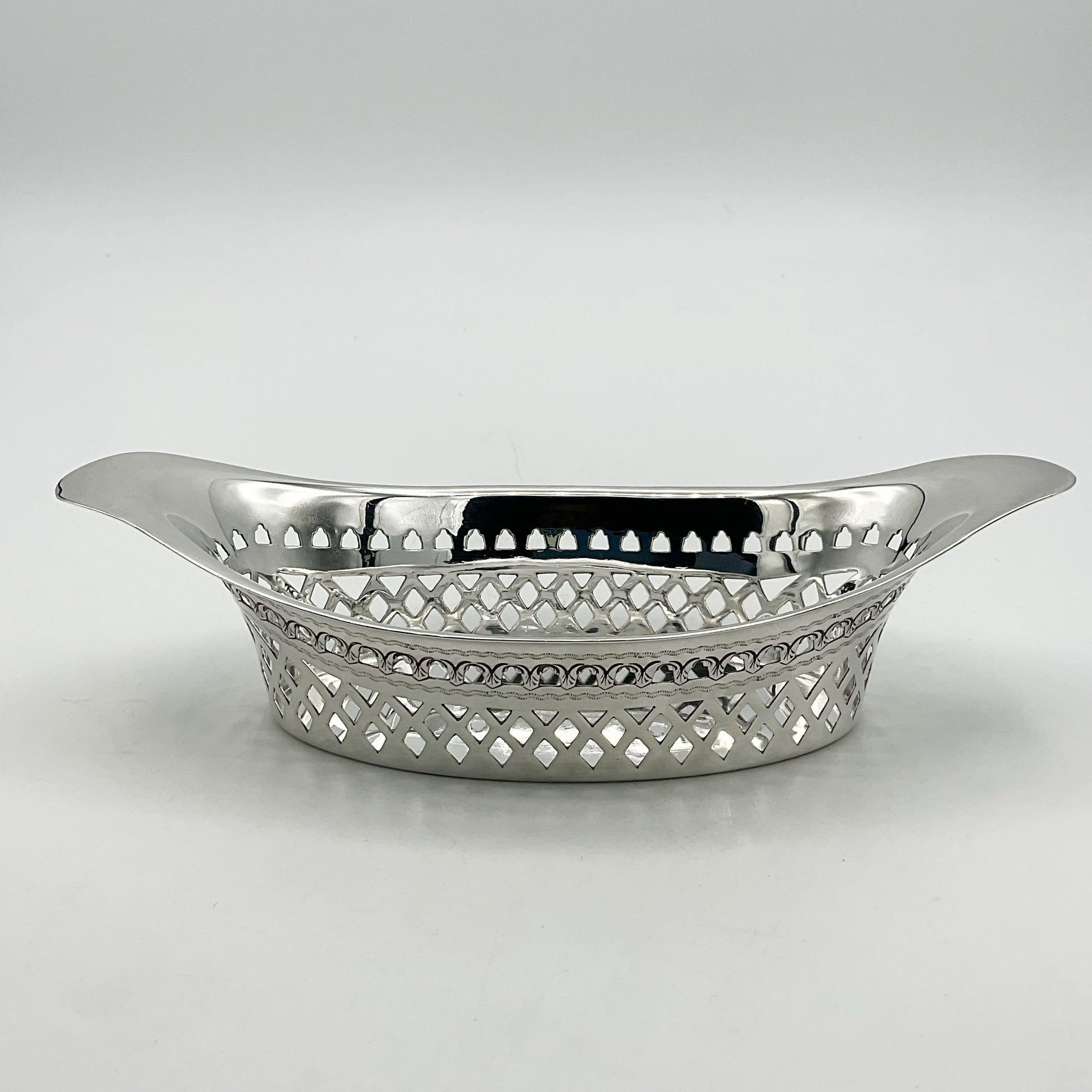 Side view of beautifully decorated silver bowl