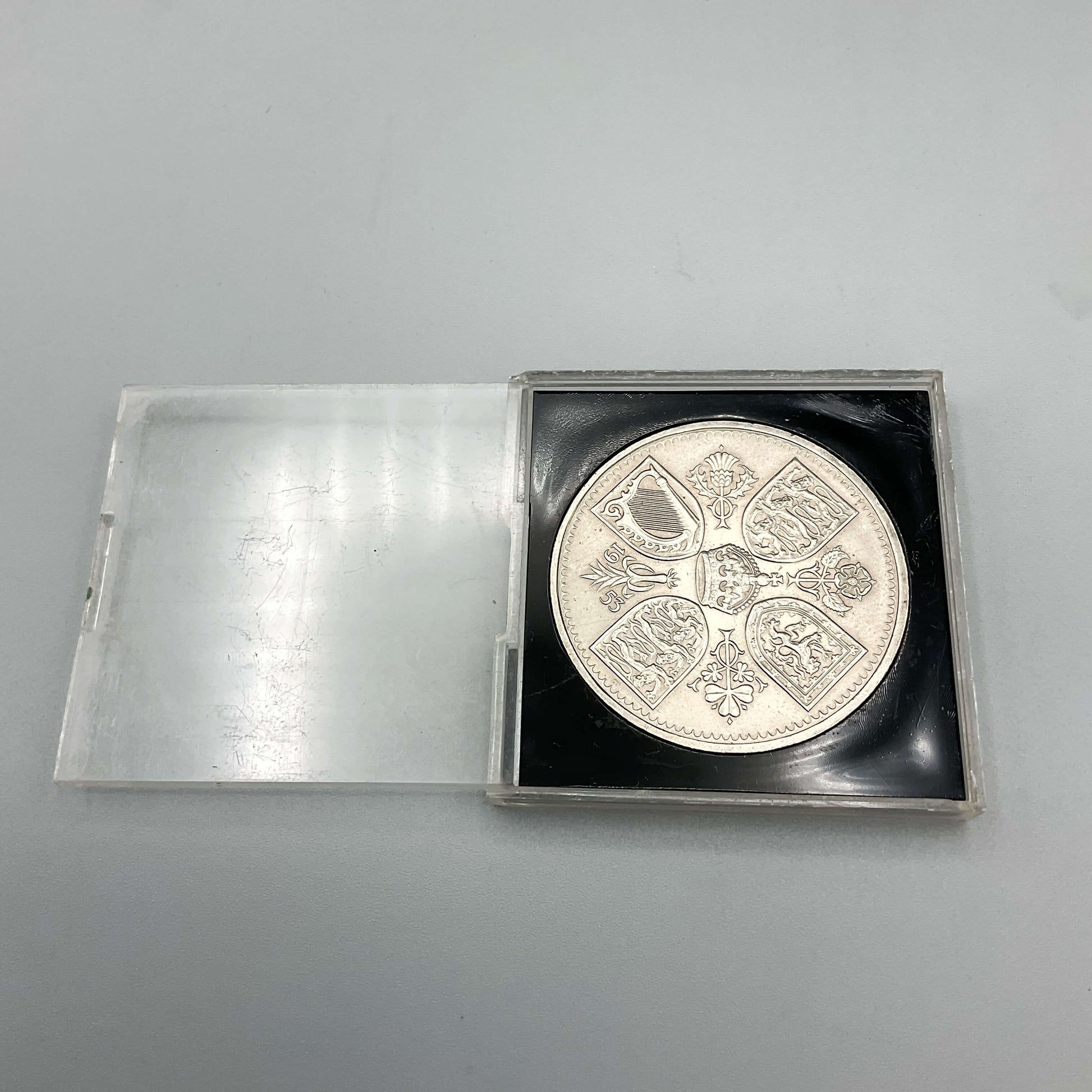 Queen Elizabeth II Coronation Five Shilling Coin in a Perspex Case with the lid removed