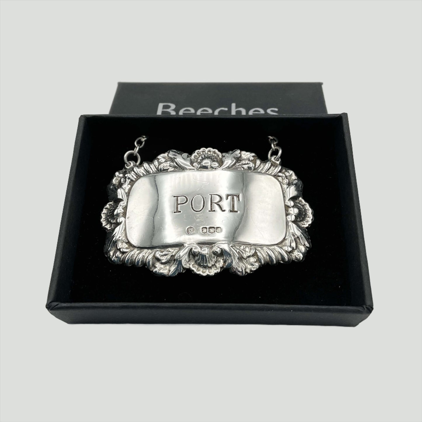 silver Port decanter label in a black presentation box