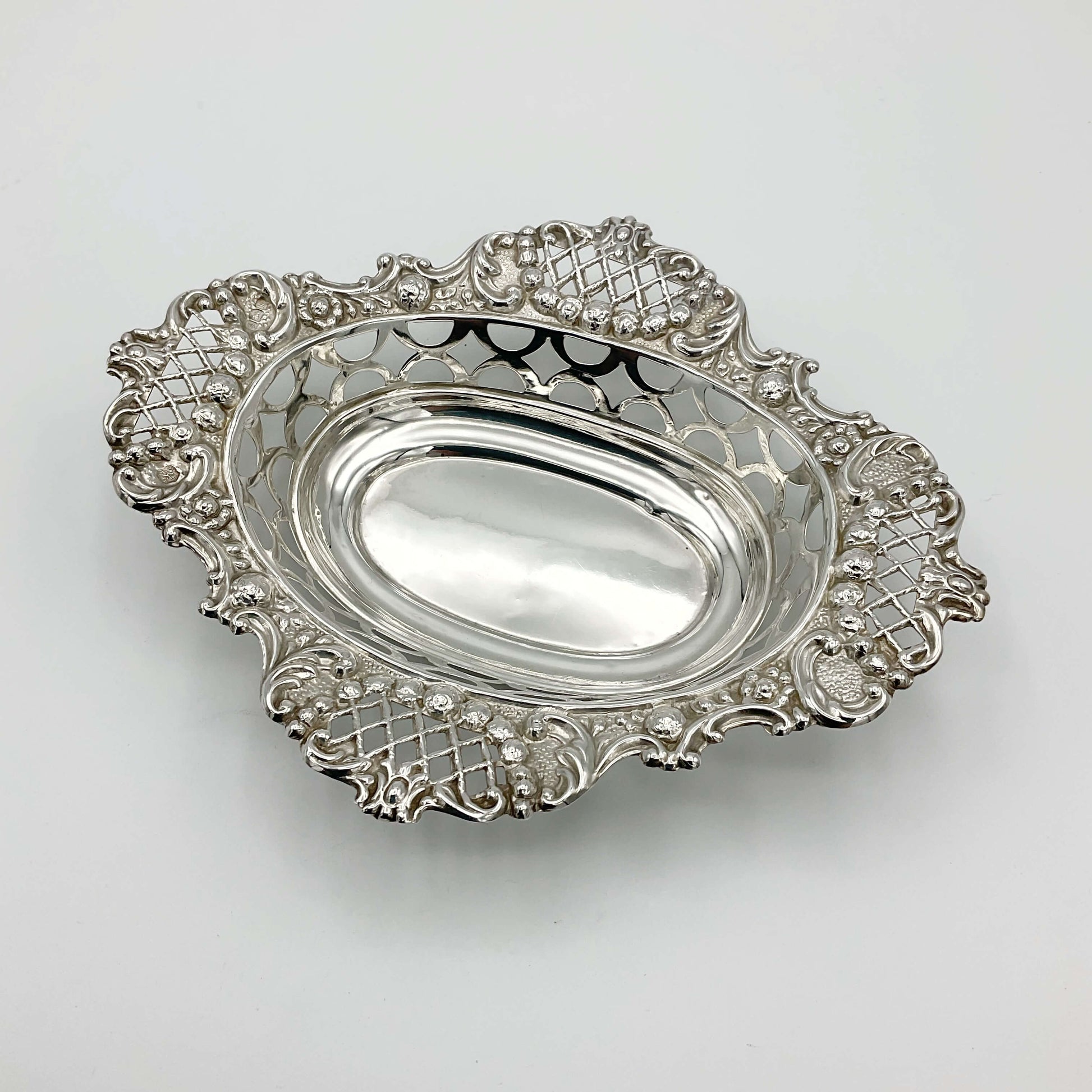Antique Edwardian silver sweets bowl on white background 