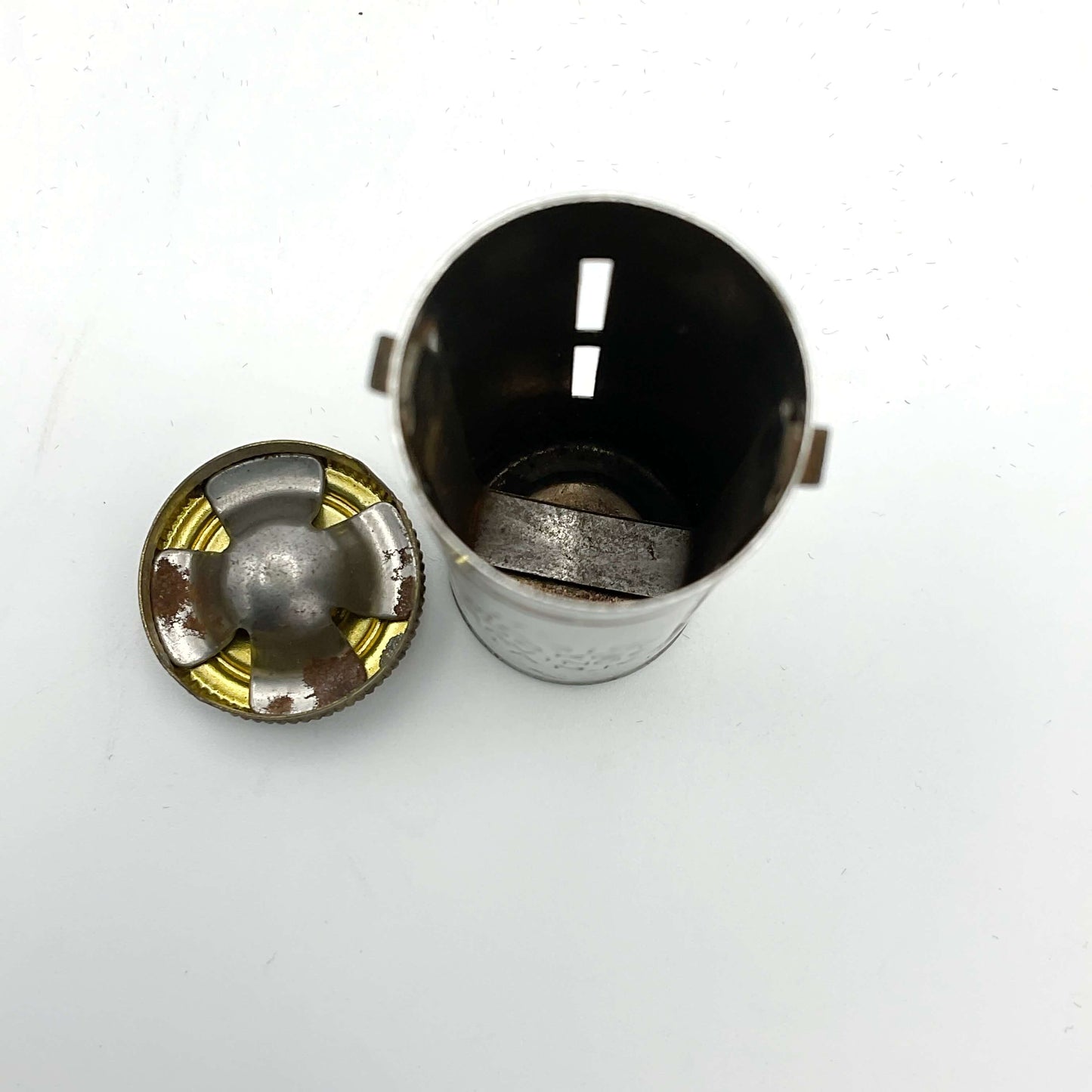 View of the inside of the vintage coin holder with the lid off