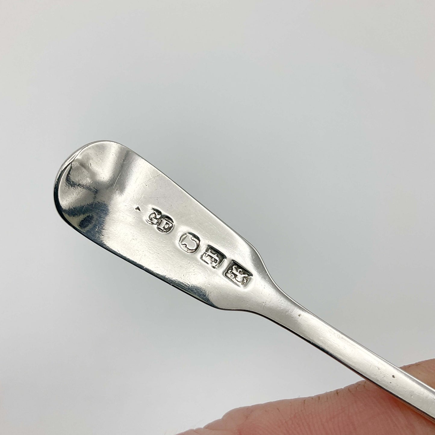 Hallmarks on the back of the antique silver salt spoon handle