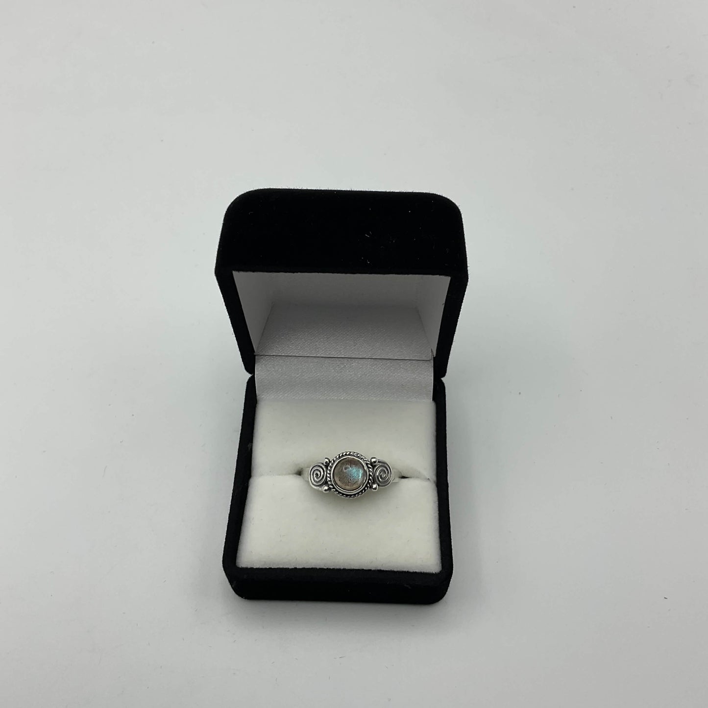 A moonstone silver ring in a presentation box
