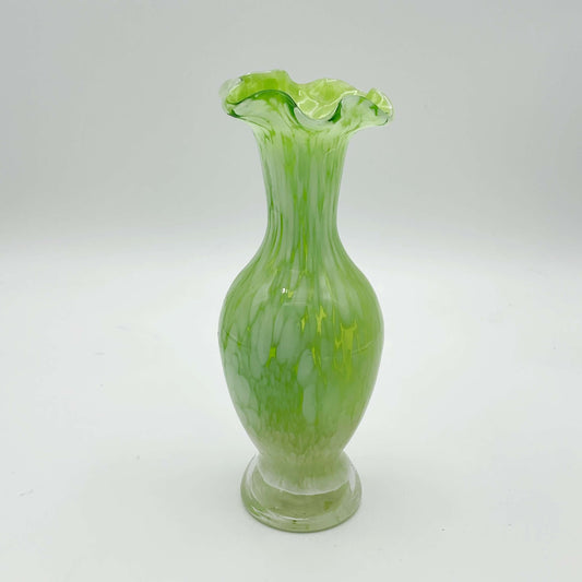 Green and white Murano glass bud vase from the 1960s on a white background 