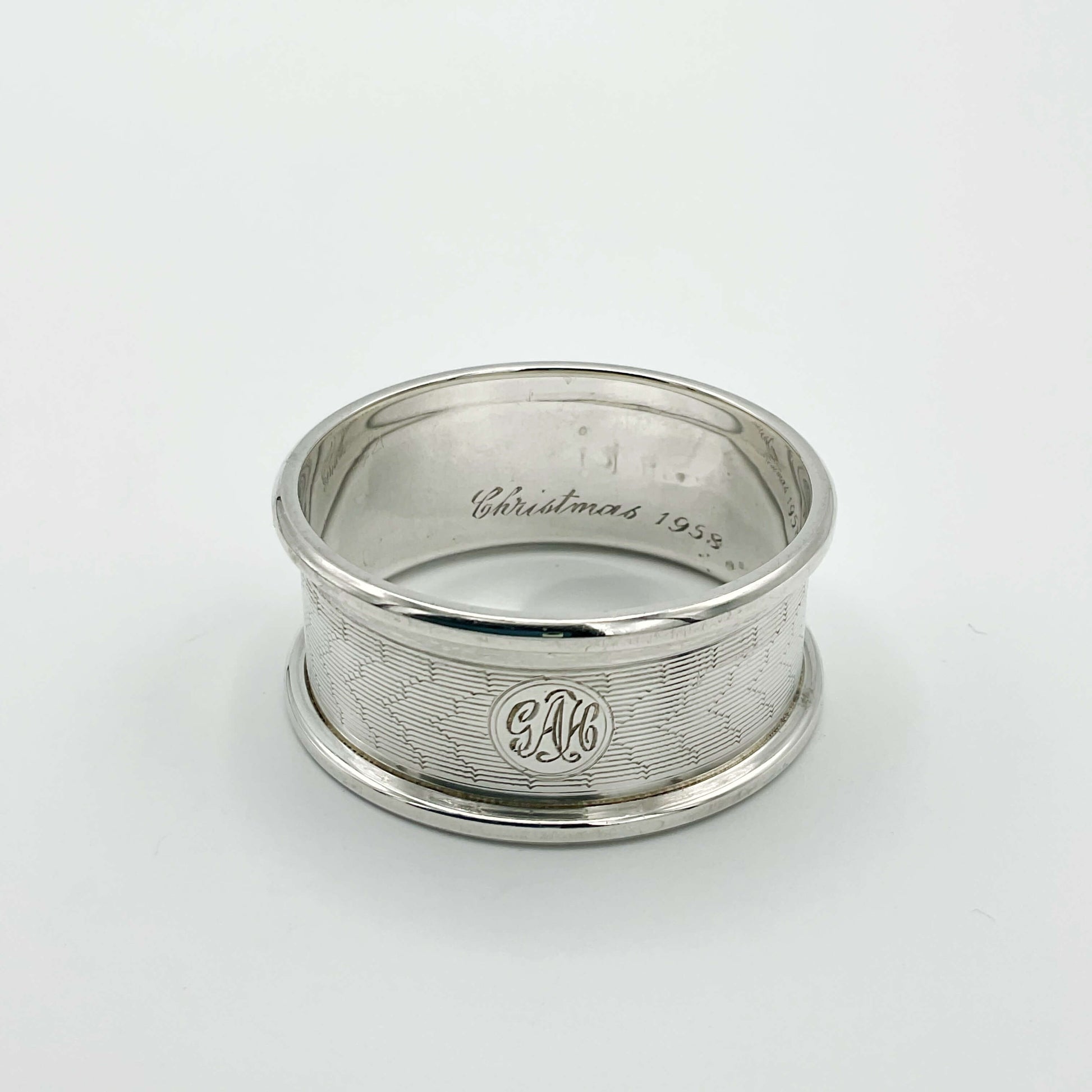 Silver napkin ring with Christmas 1958 engraved inside