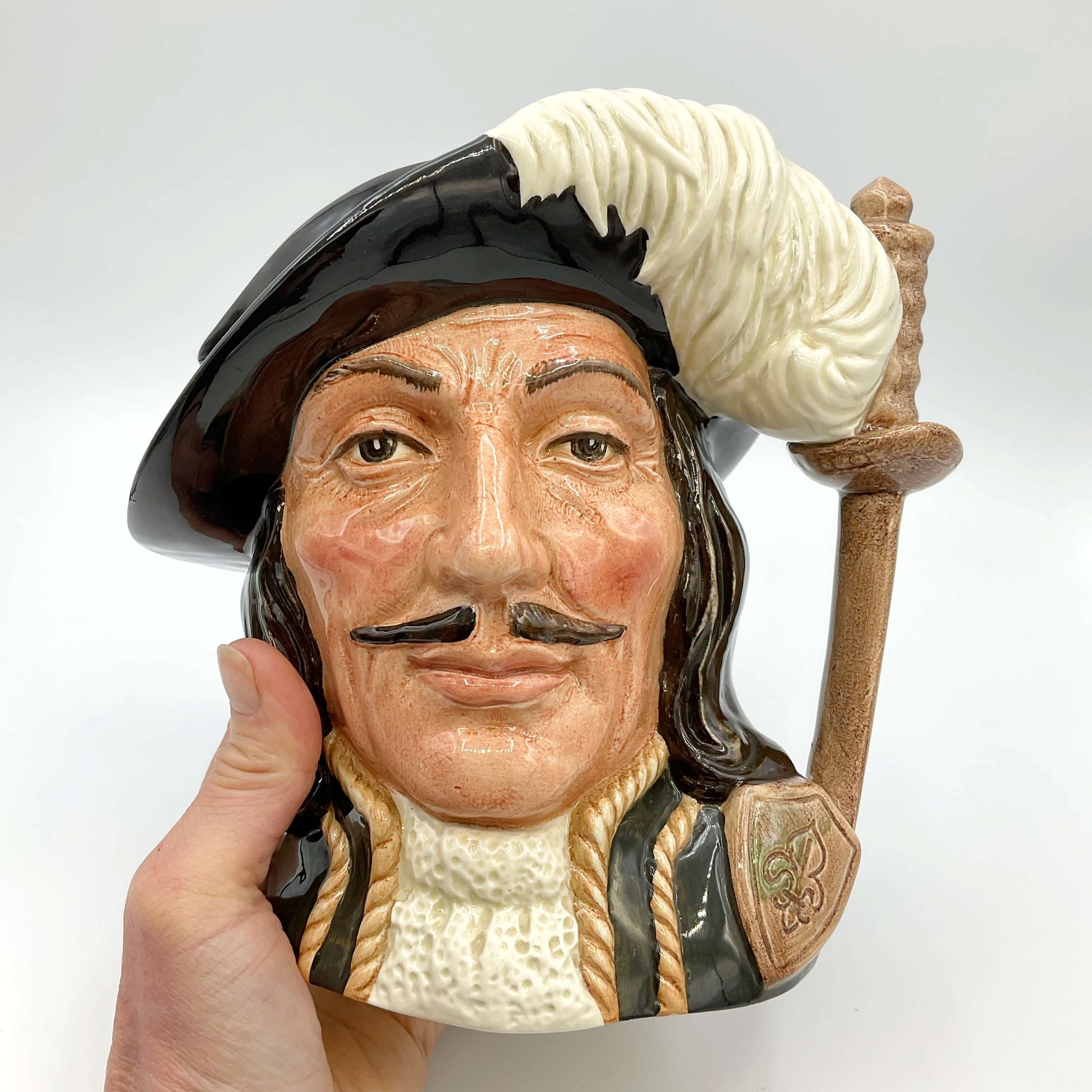 Large Royal Doulton Athos Toby Jug held in a hand