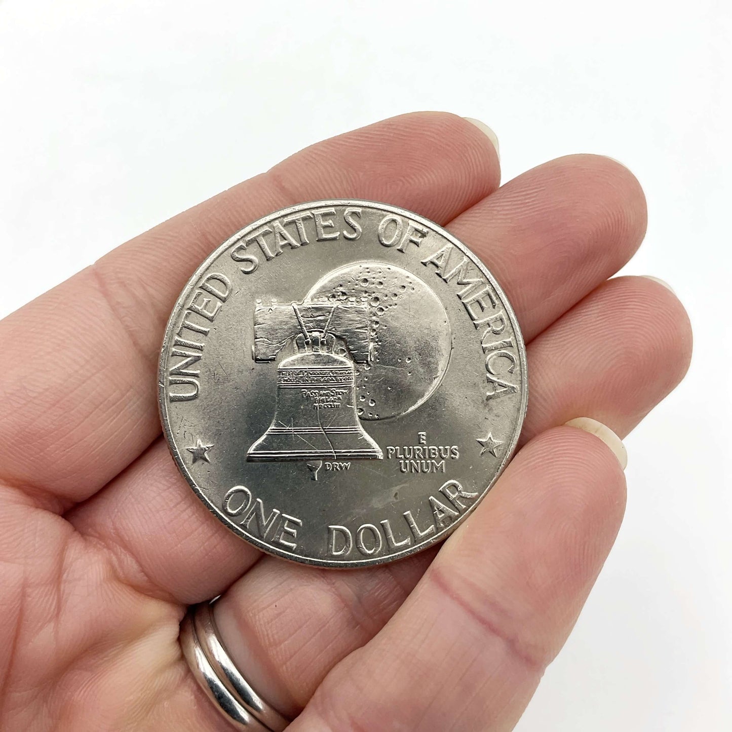 Moneda vintage de un dólar de Eisenhower de 1976