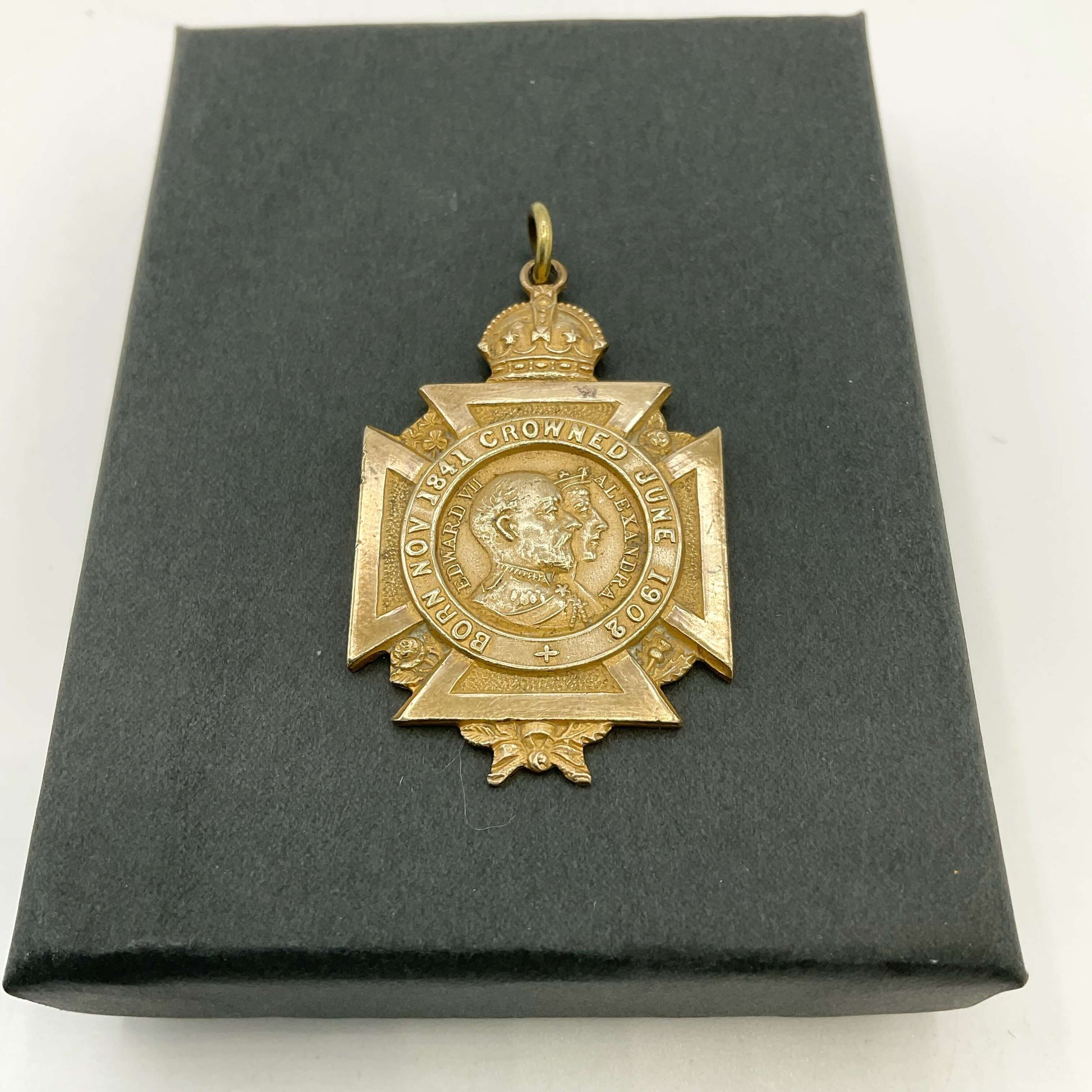 Brass 1902 coronation medal on black box